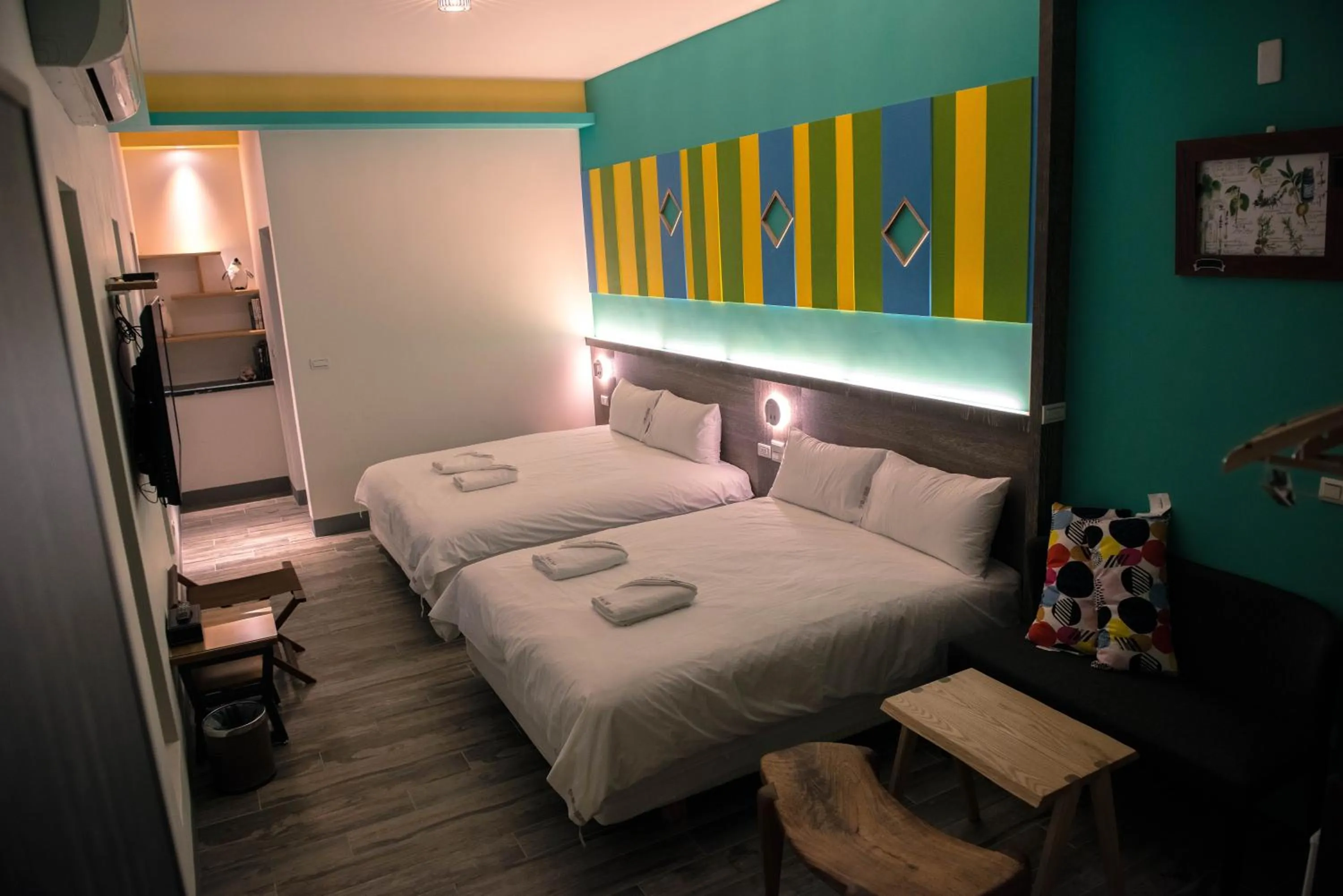 Bed in Happy Wing Guesthouse