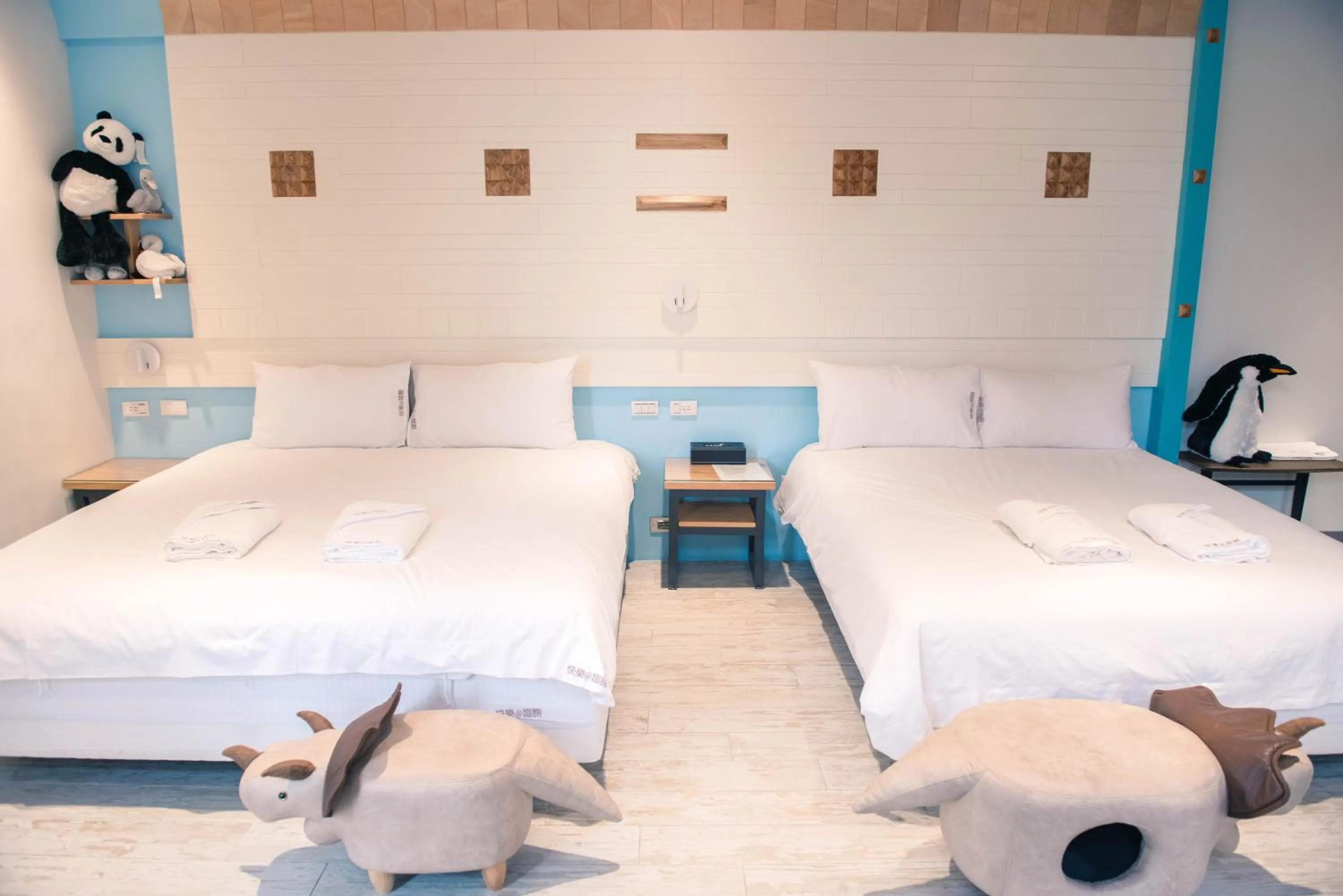 Bed in Happy Wing Guesthouse