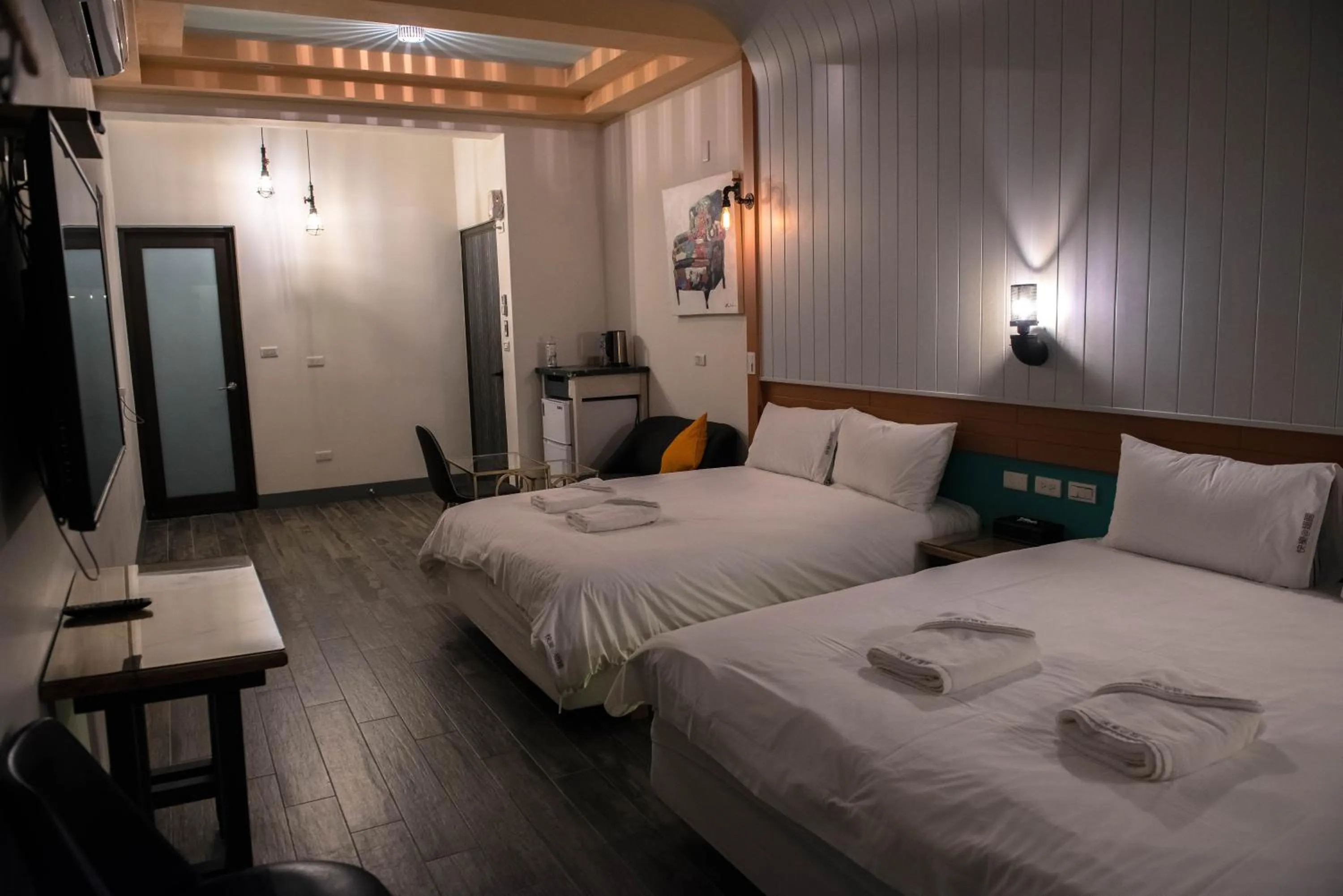 Bed in Happy Wing Guesthouse