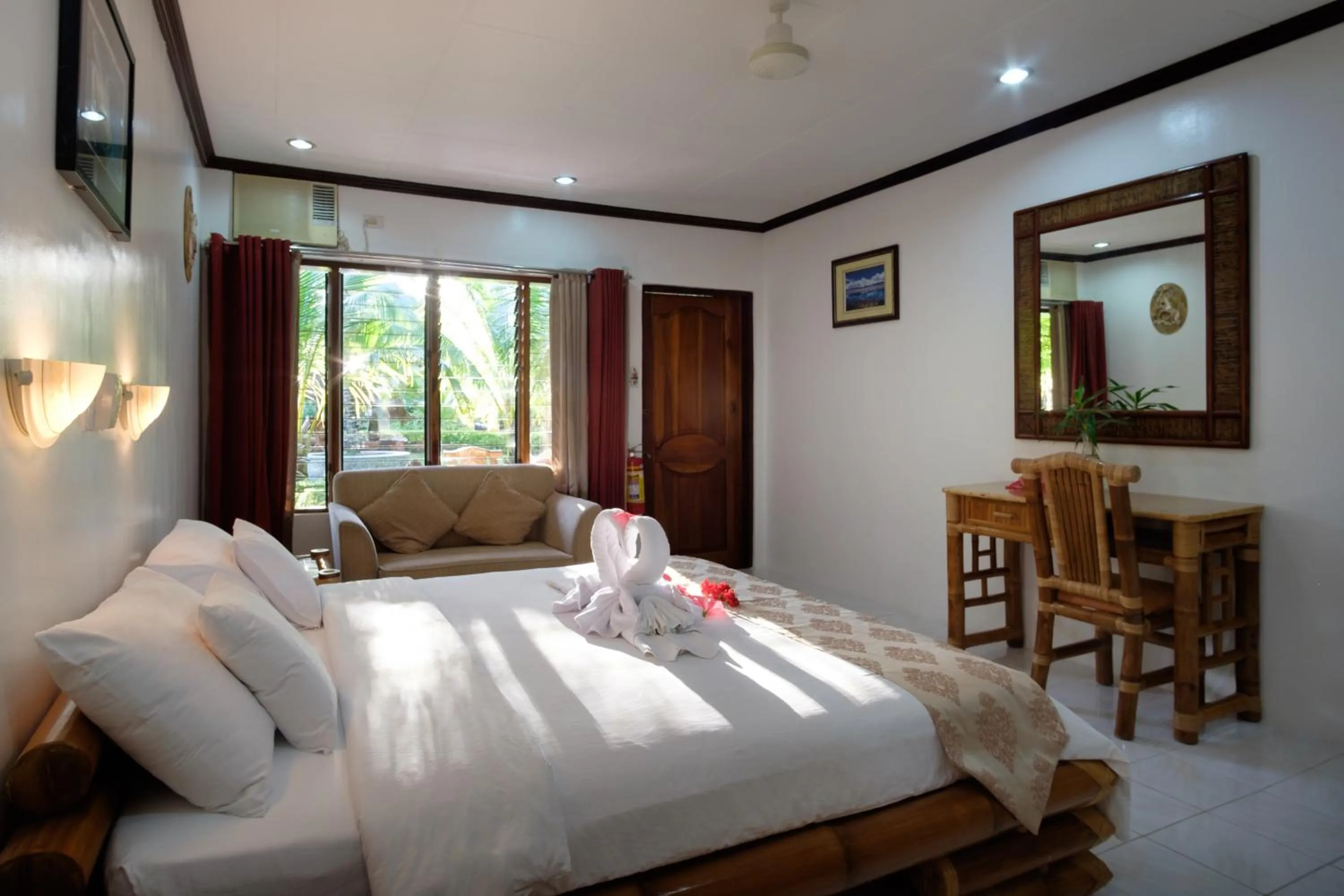 Bed in Kasai Village Dive Resort