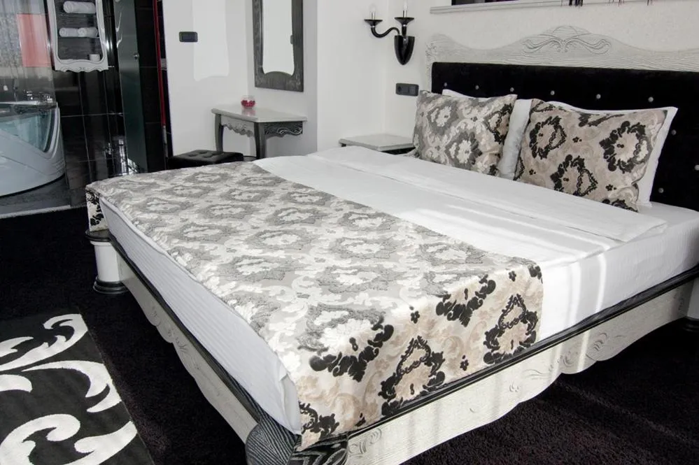 Bed in Hill Hotel Wellness & Spa