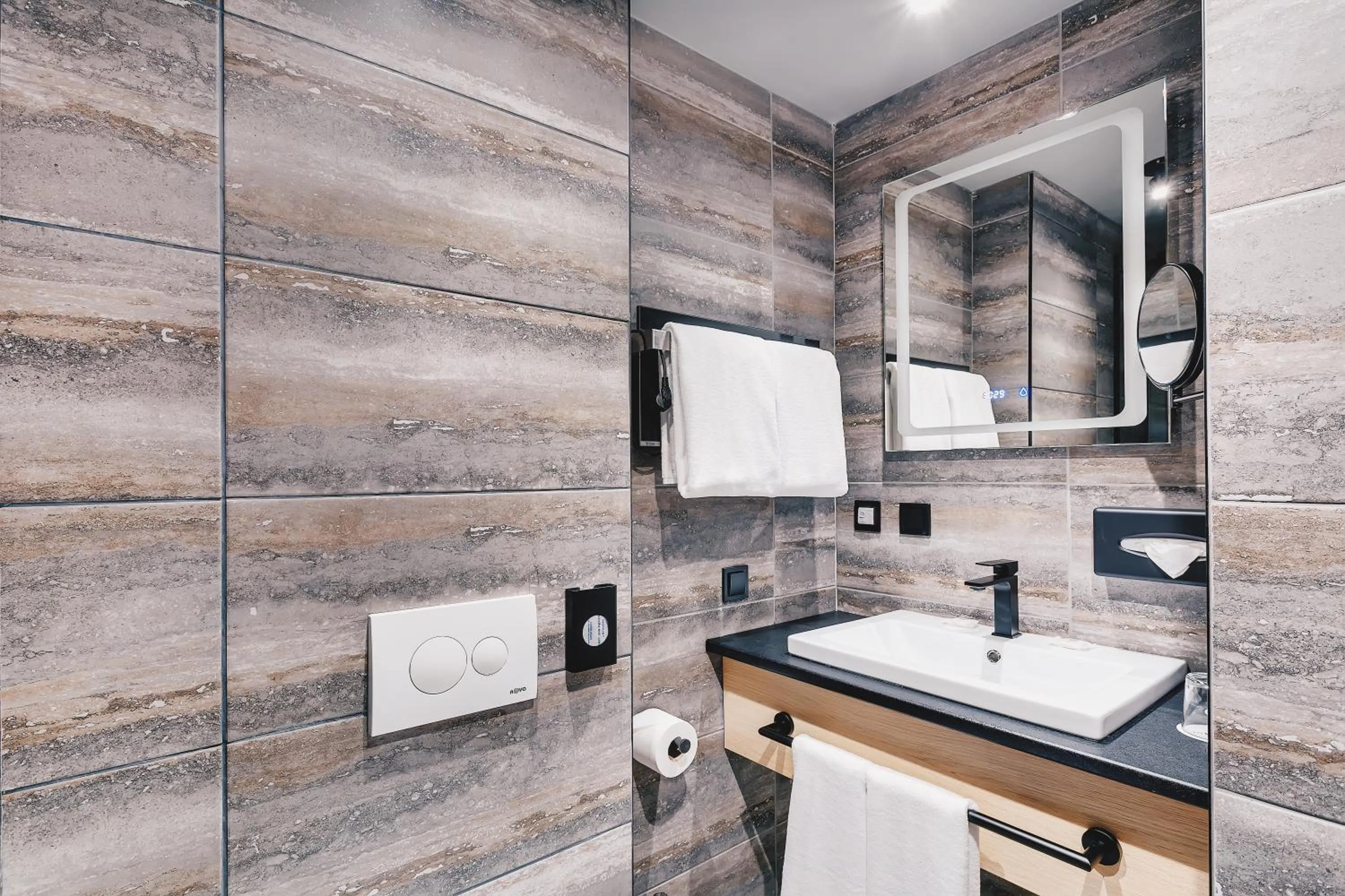 Bathroom in IQ Hotel