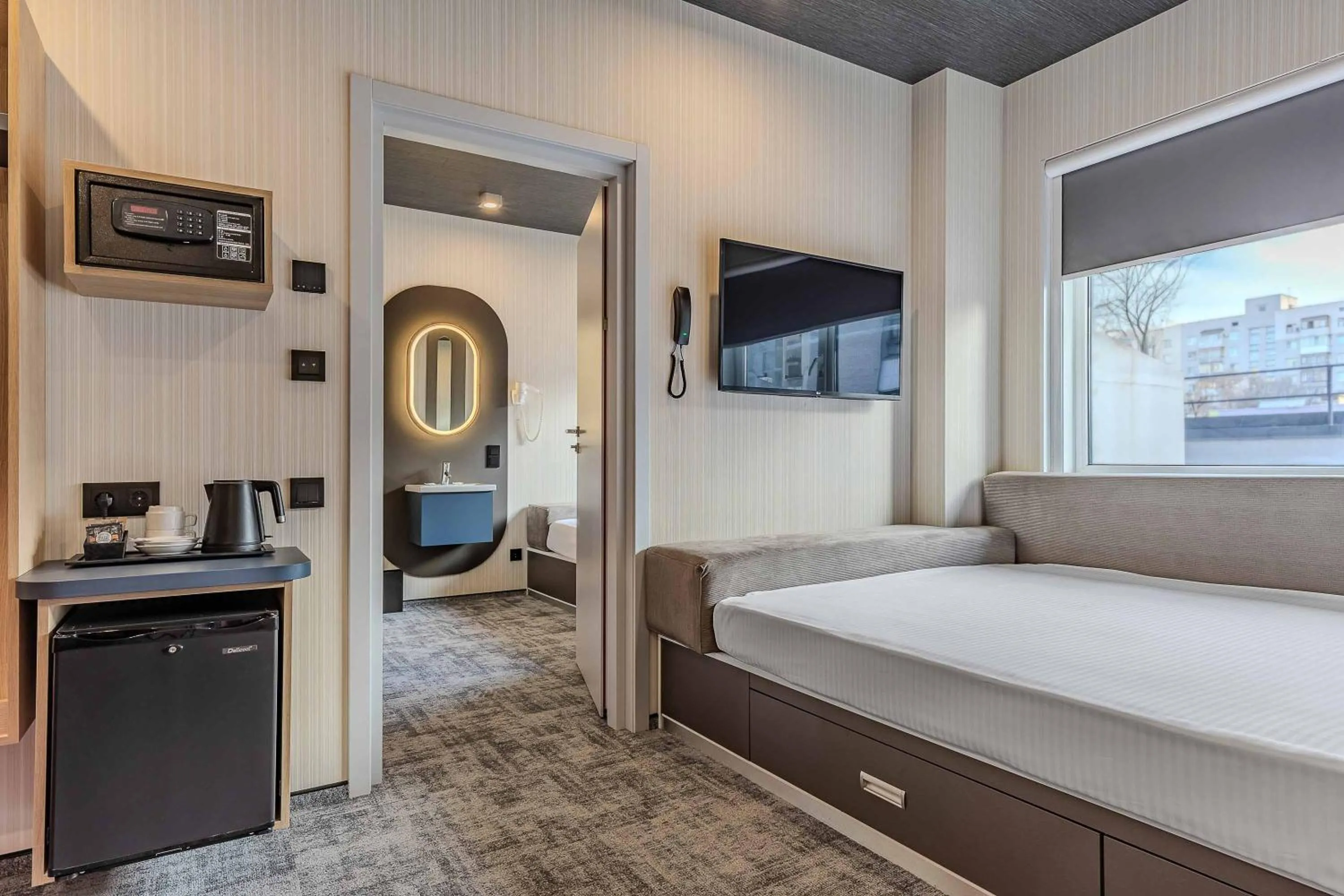 Coffee/tea facilities, Bed in IQ Hotel