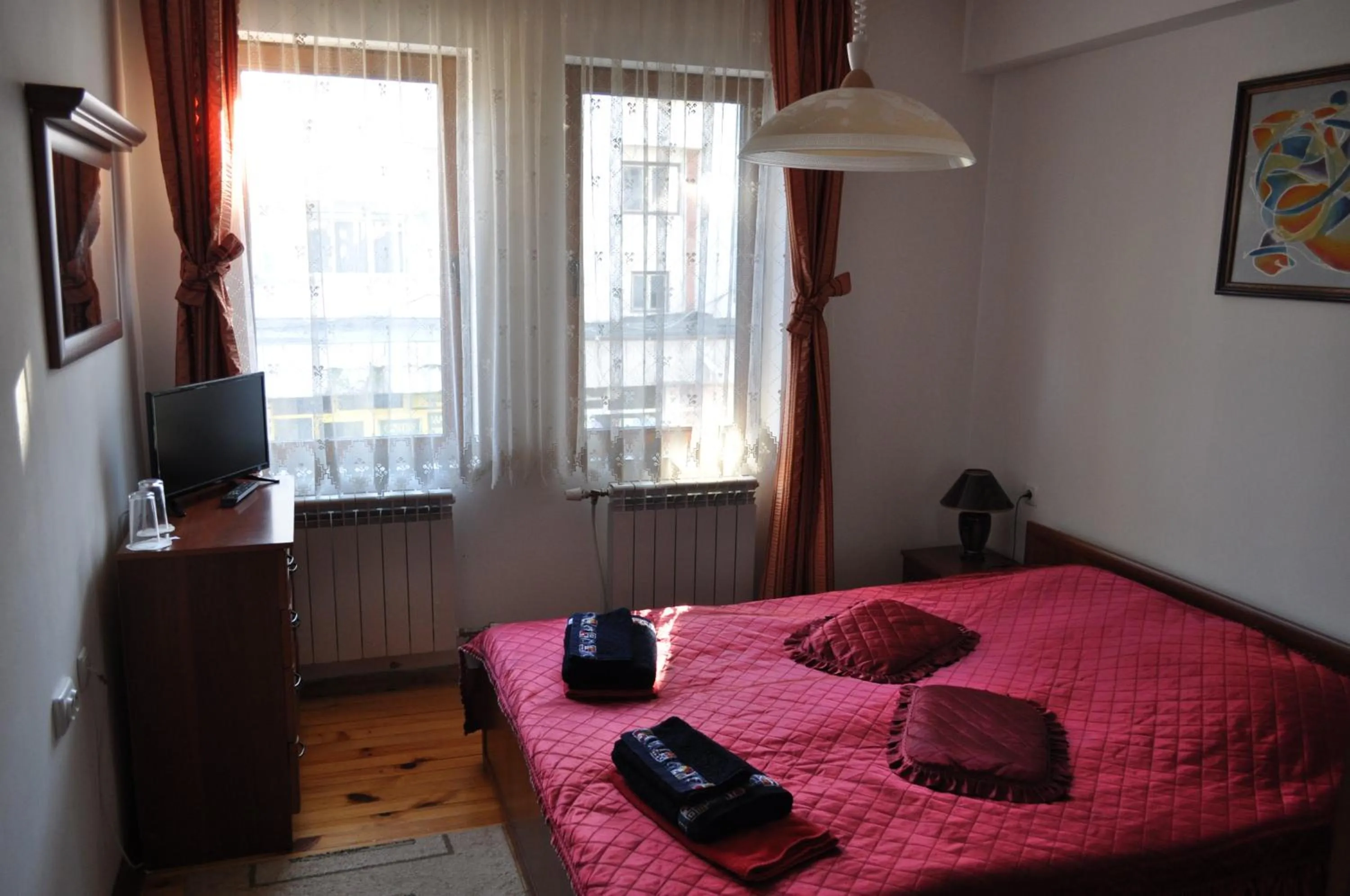 Photo of the whole room, Bed in Family Hotel Biju