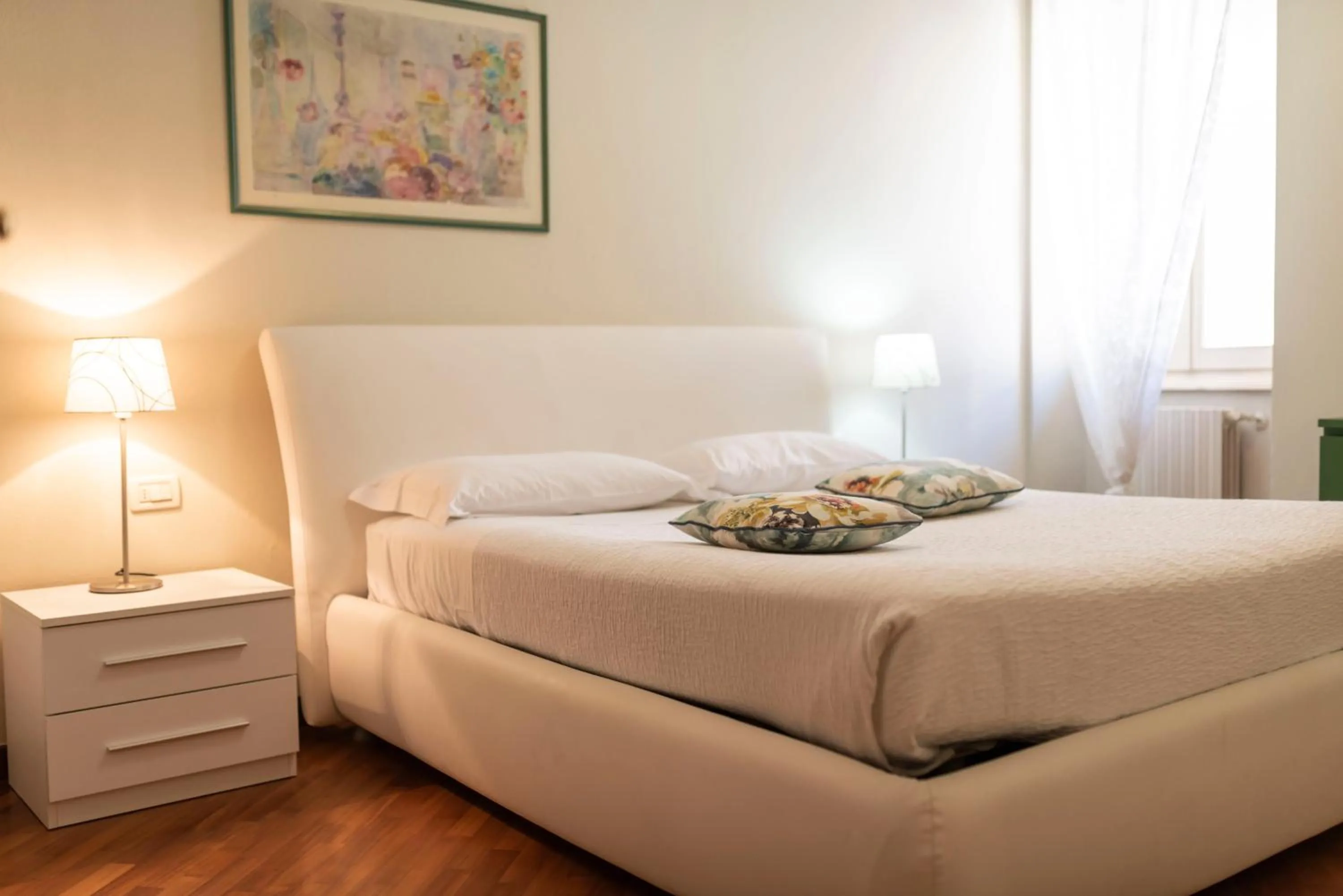 Bed in Aromi Piccolo Hotel