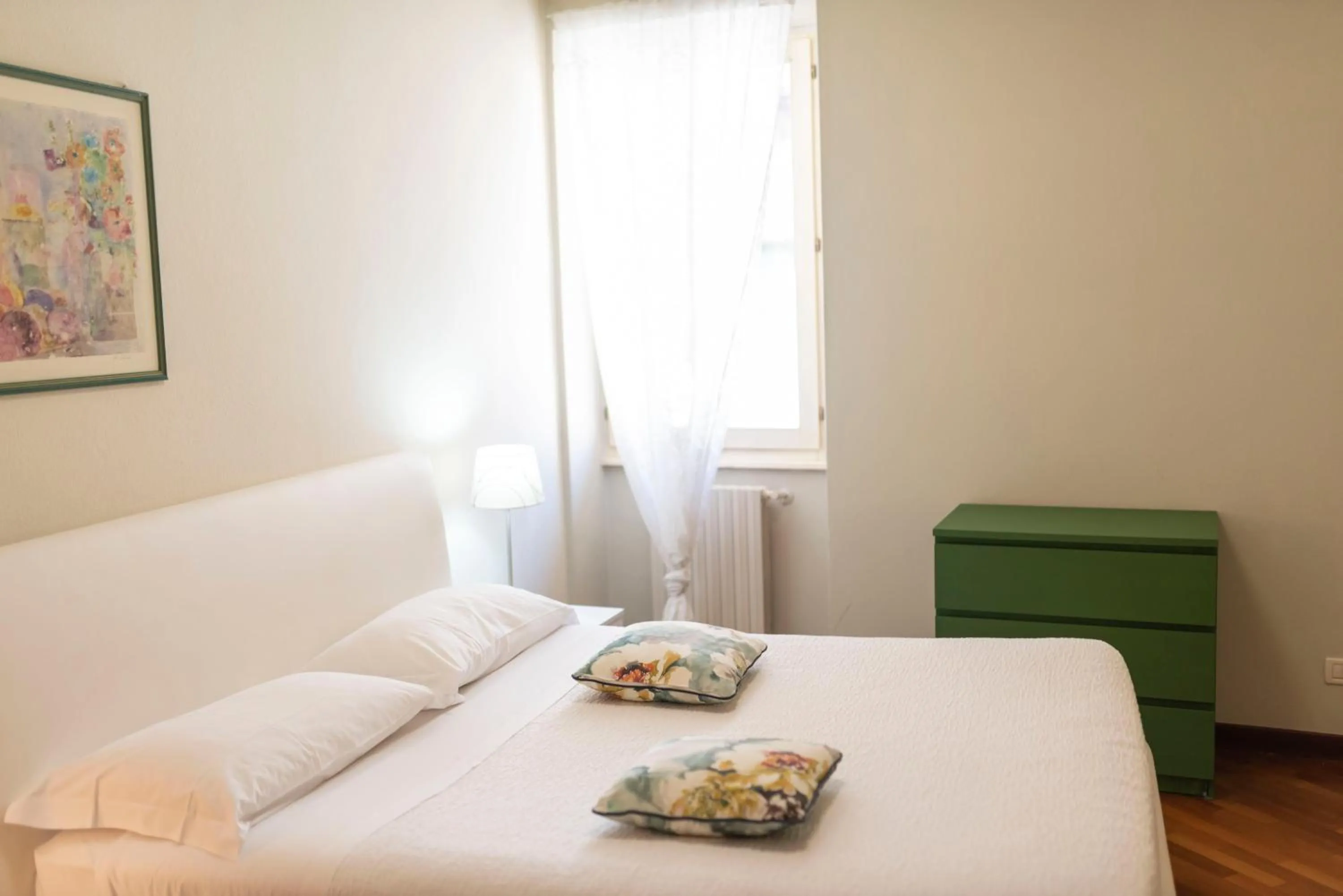 Bed in Aromi Piccolo Hotel