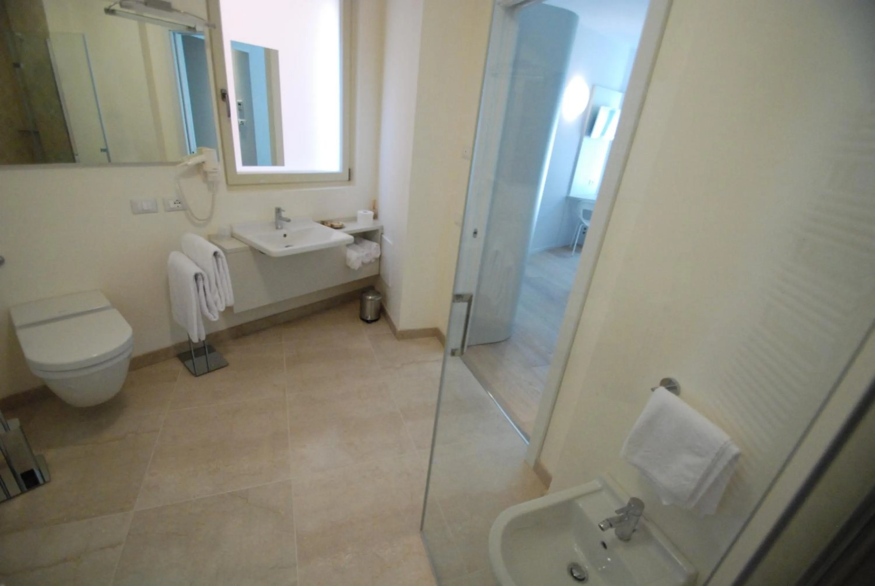 Bathroom in Aromi Piccolo Hotel