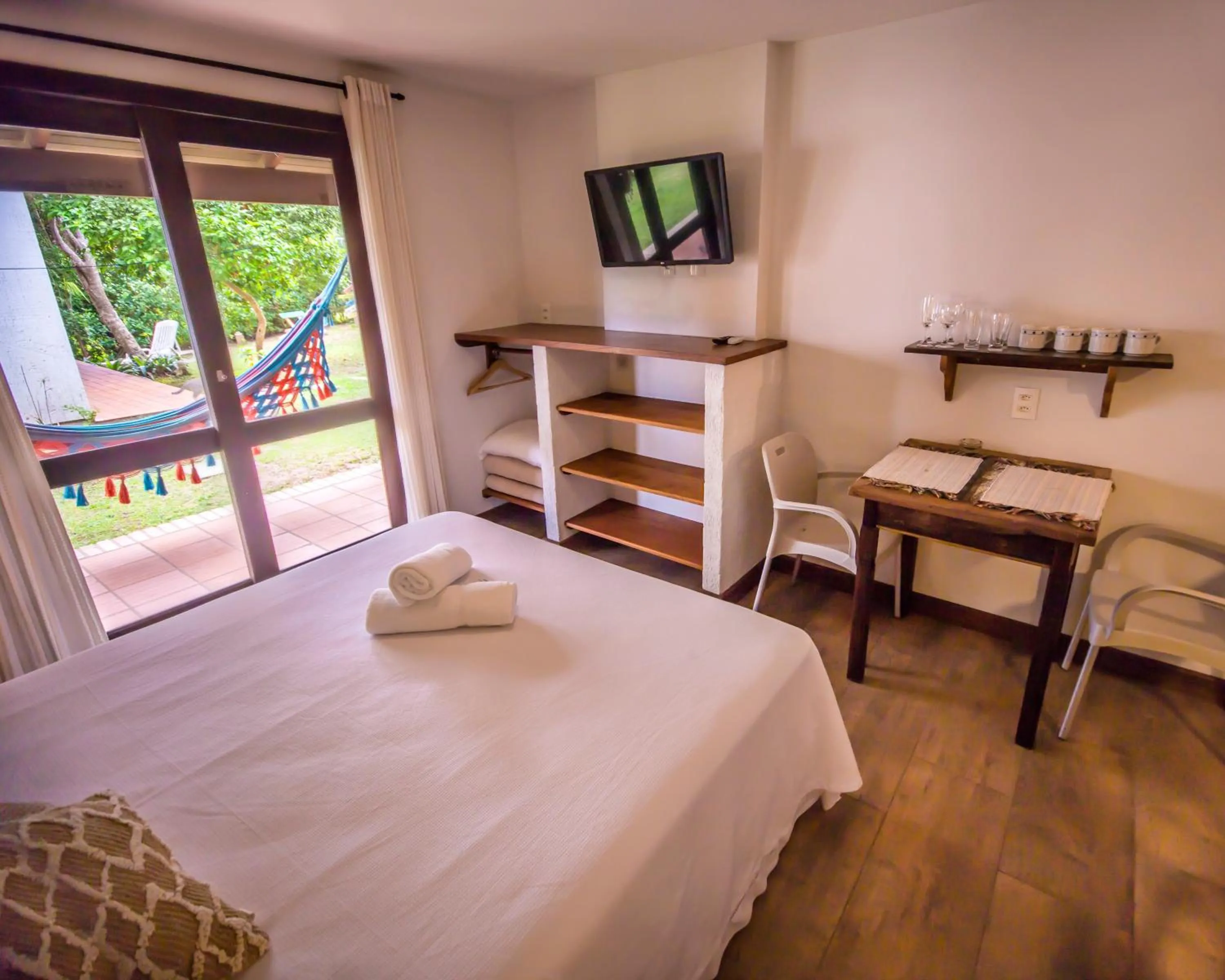 Bedroom, Bed in Pousada Capitão Cook, banheira, a 200 m do centro, amplo estacionamento, linda vista