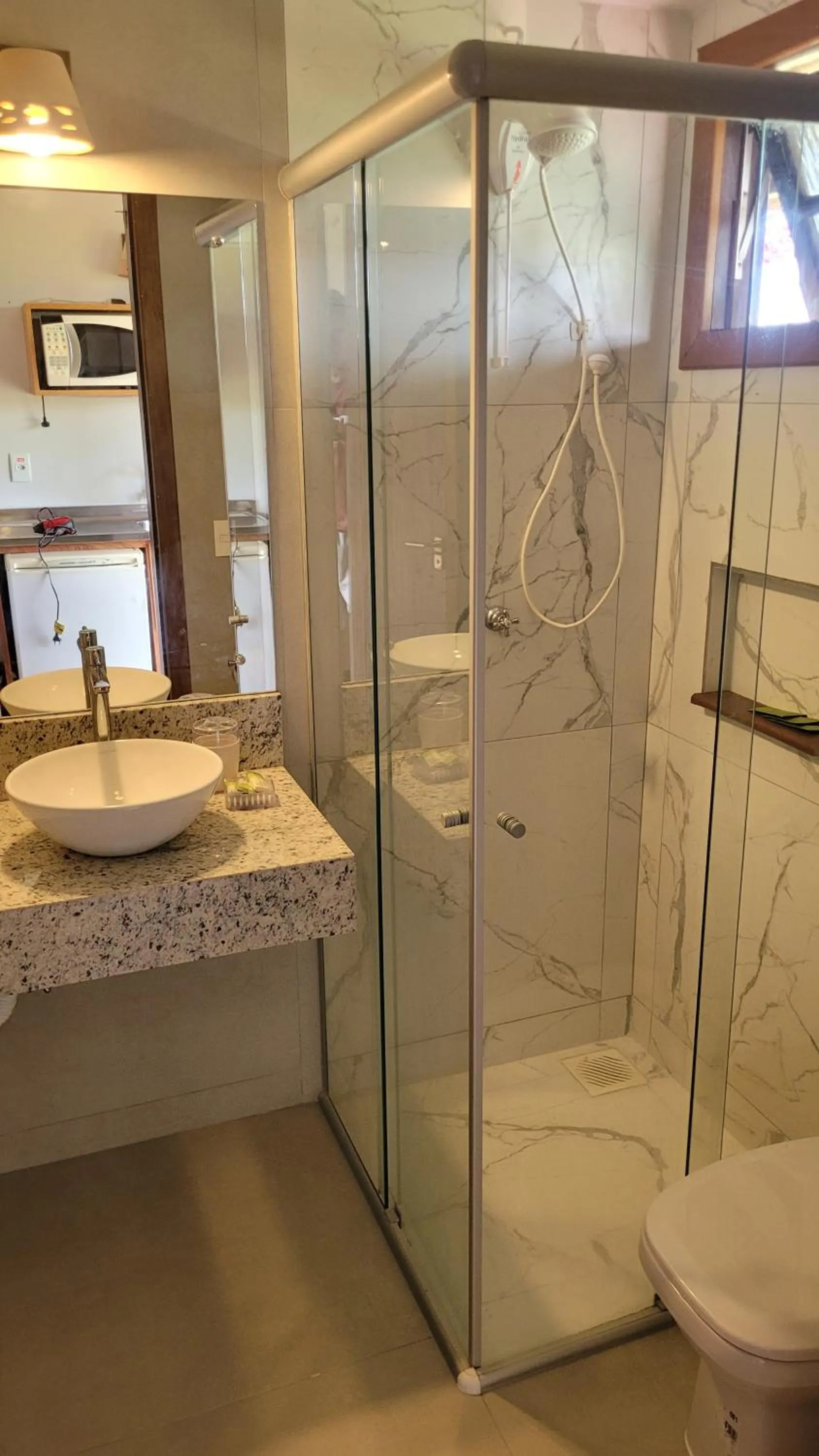 Bathroom in Pousada Capitão Cook, banheira, a 200 m do centro, amplo estacionamento, linda vista