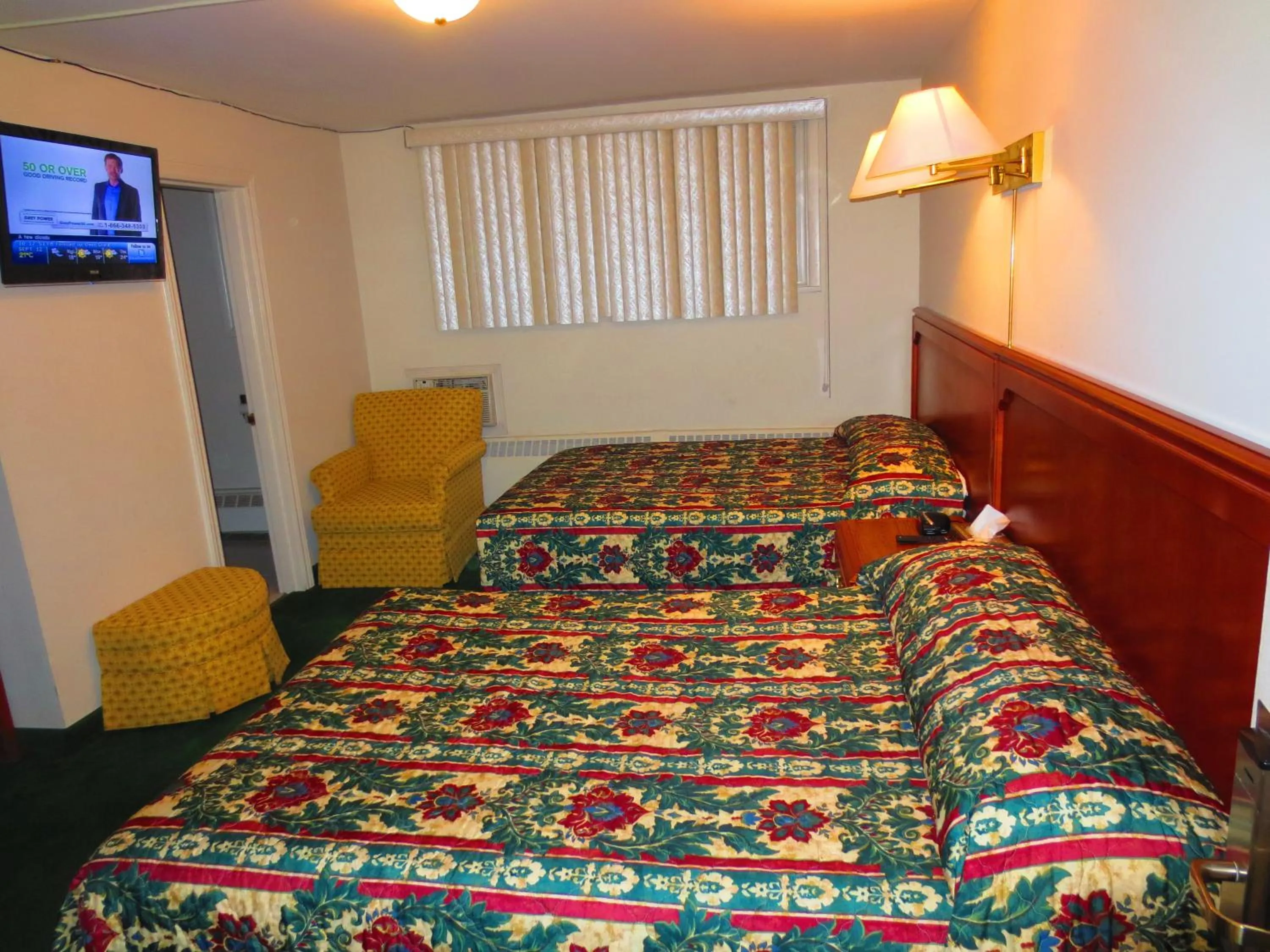 Bed in Canadiana Motel