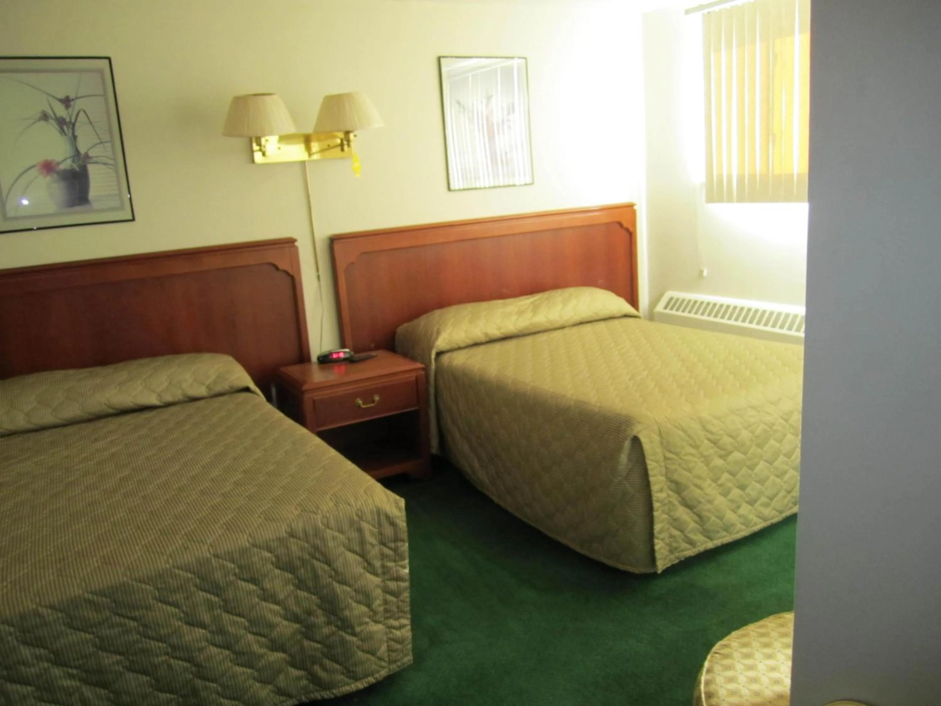Bed in Canadiana Motel