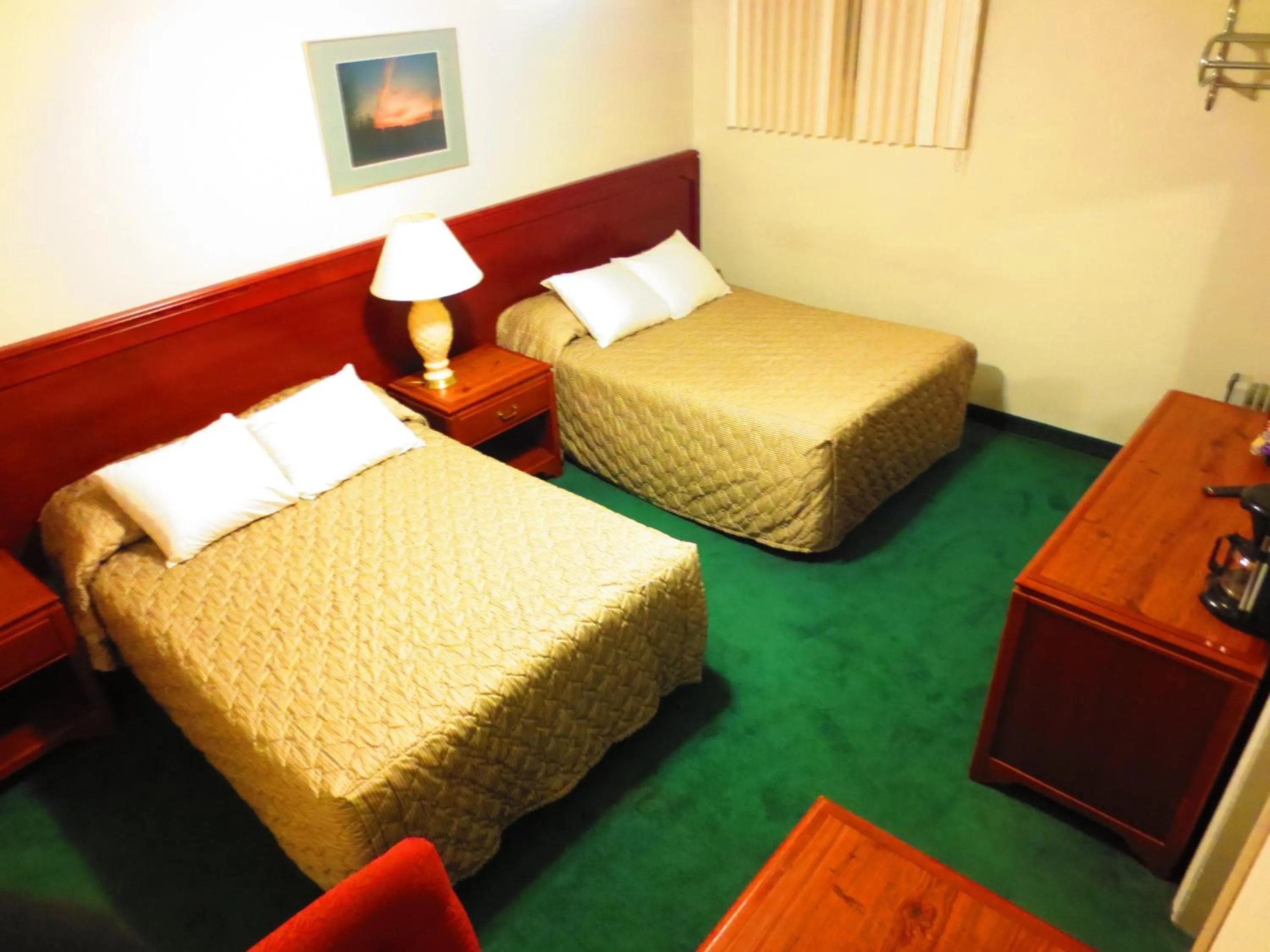 Bed in Canadiana Motel