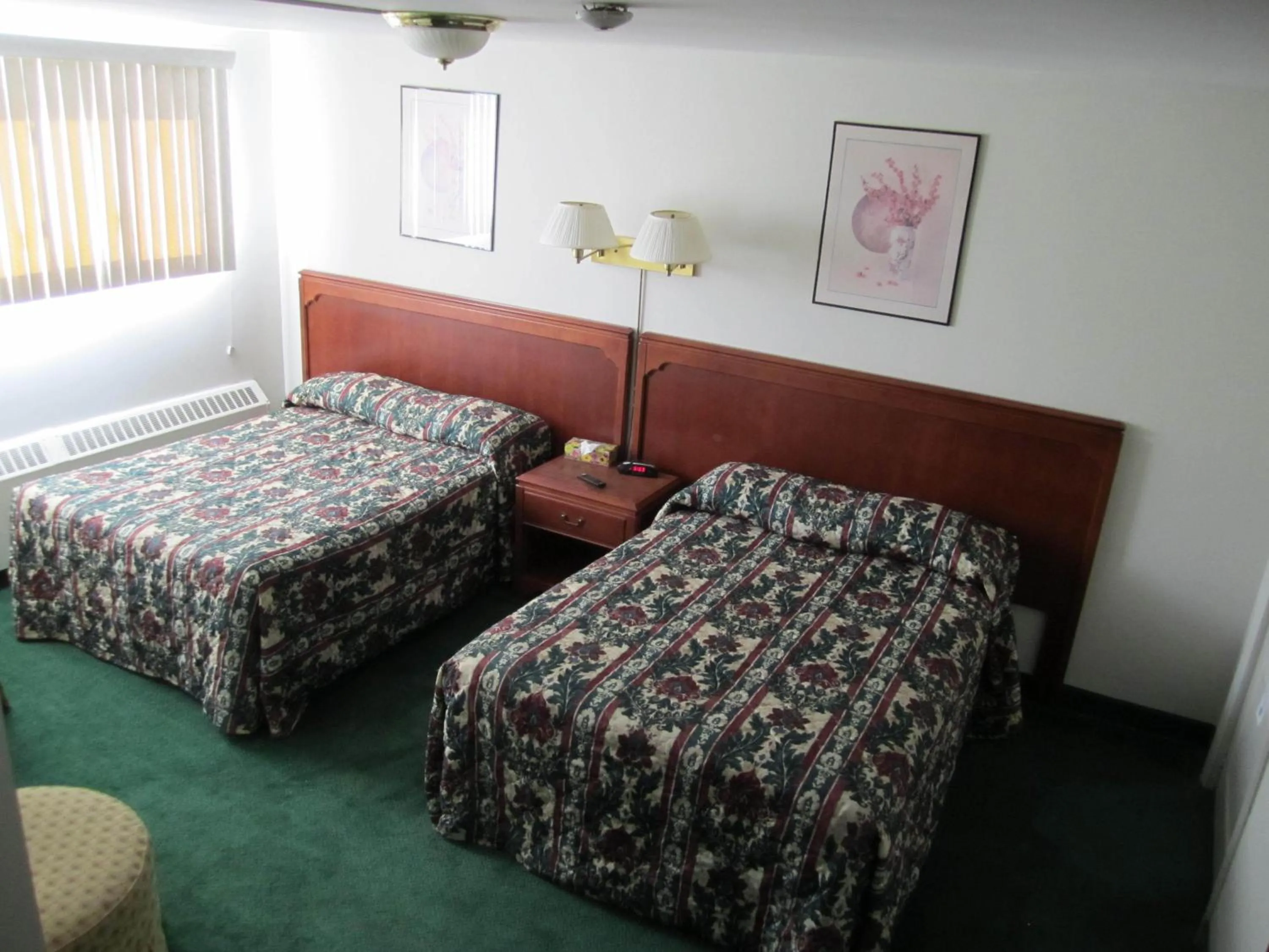 Bed in Canadiana Motel