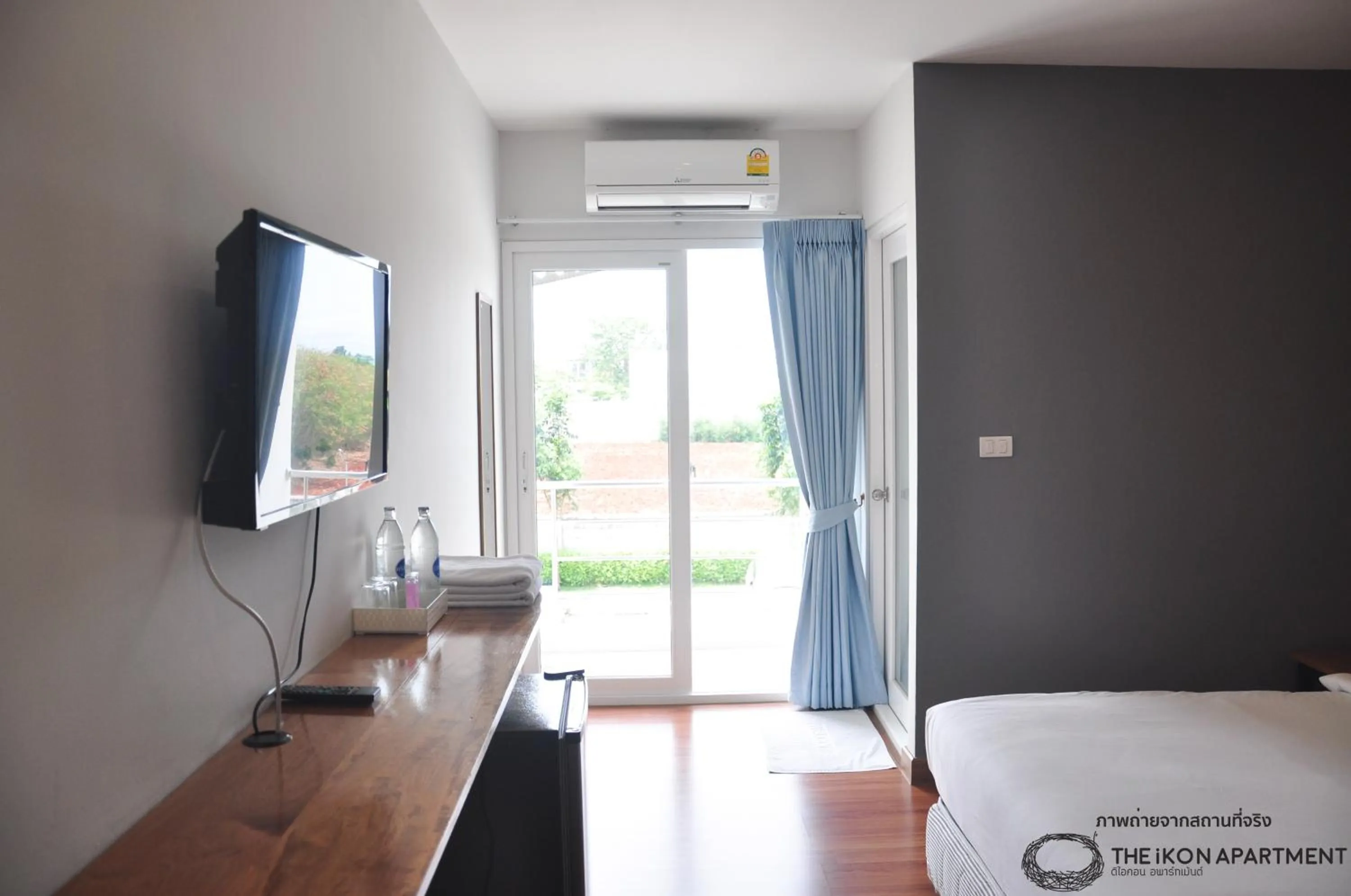 Bed in The iKon Apartment