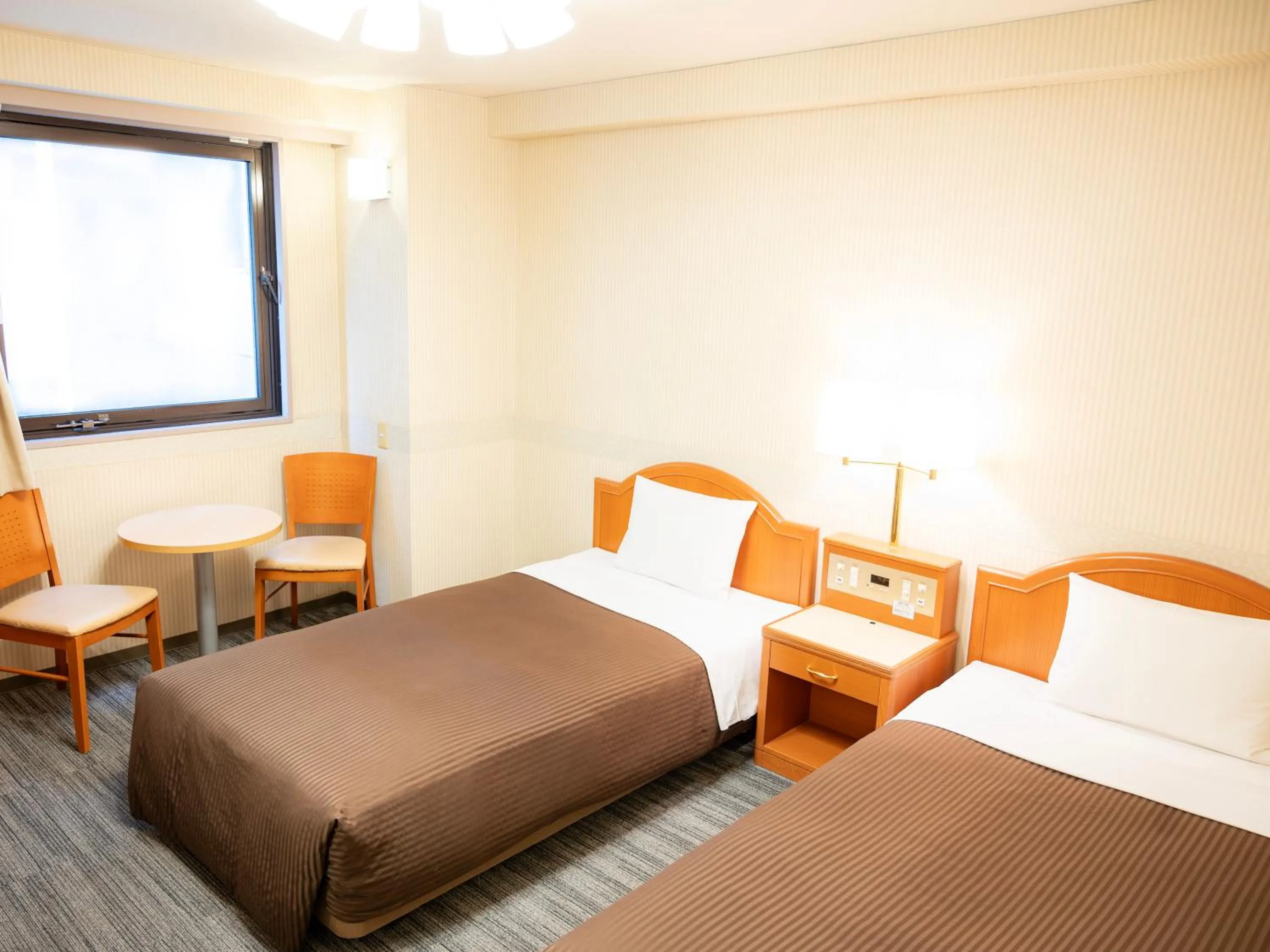 Photo of the whole room, Bed in Numazu Grand Hotel