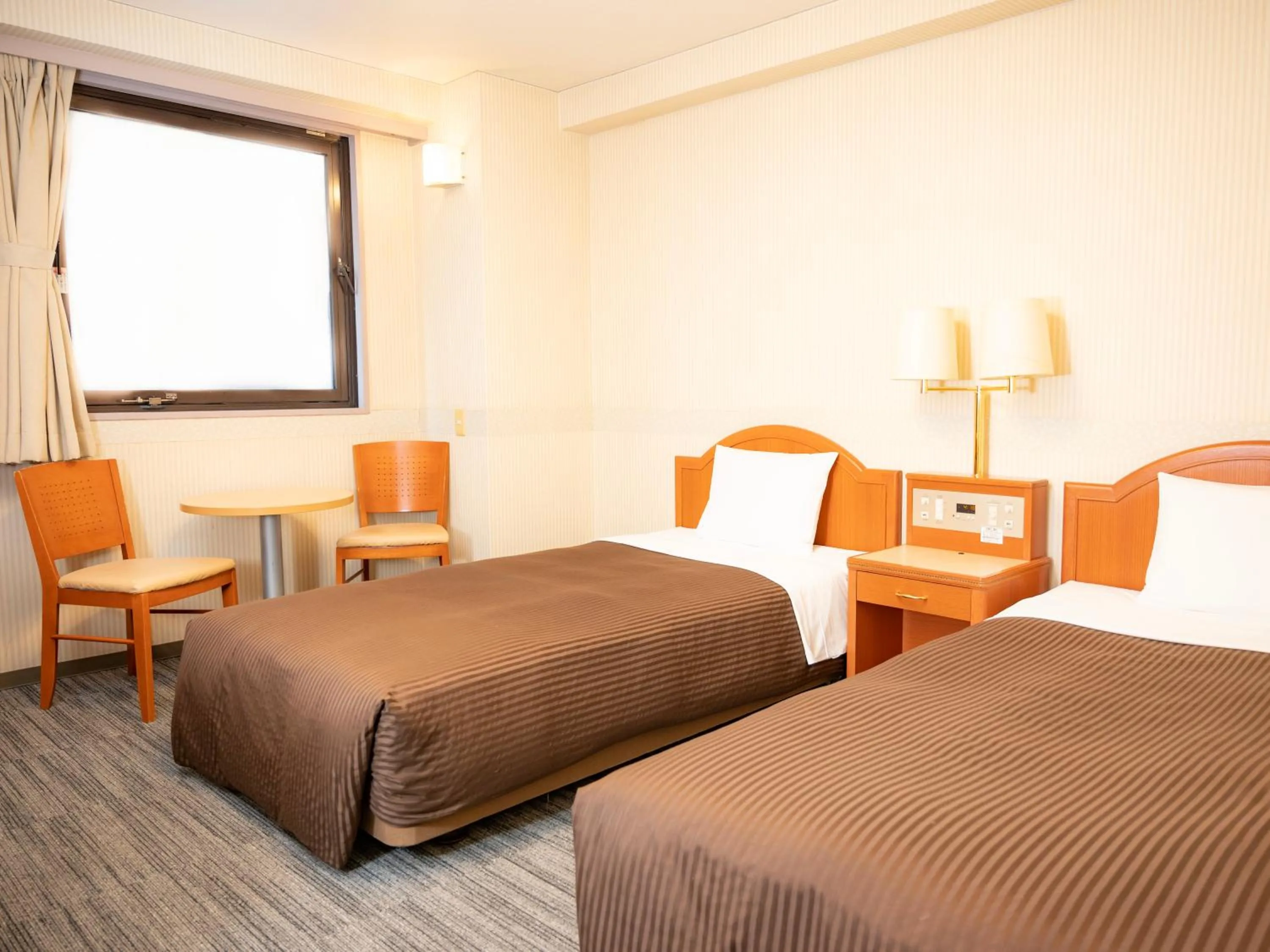 Photo of the whole room, Bed in Numazu Grand Hotel