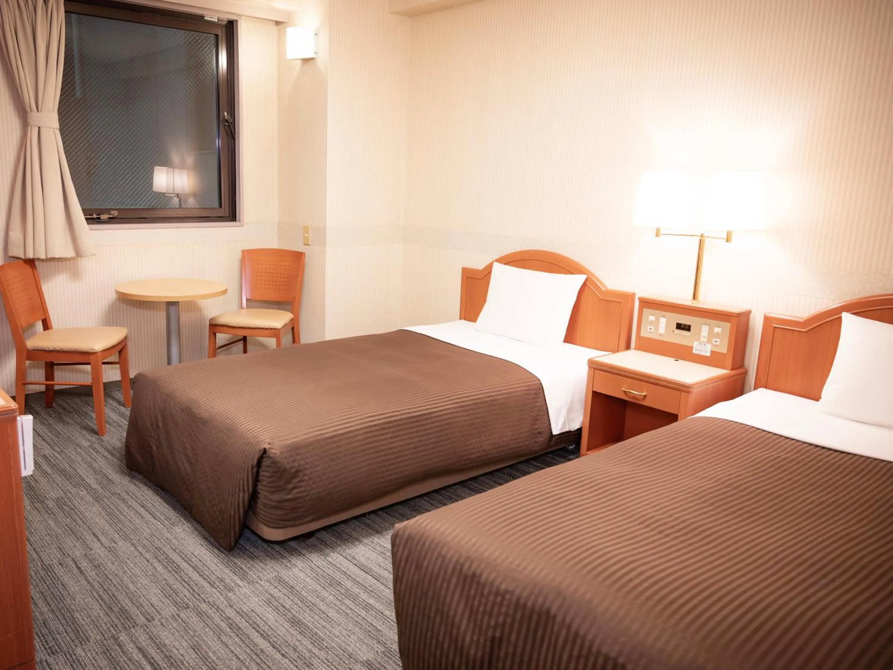 Photo of the whole room, Bed in Numazu Grand Hotel