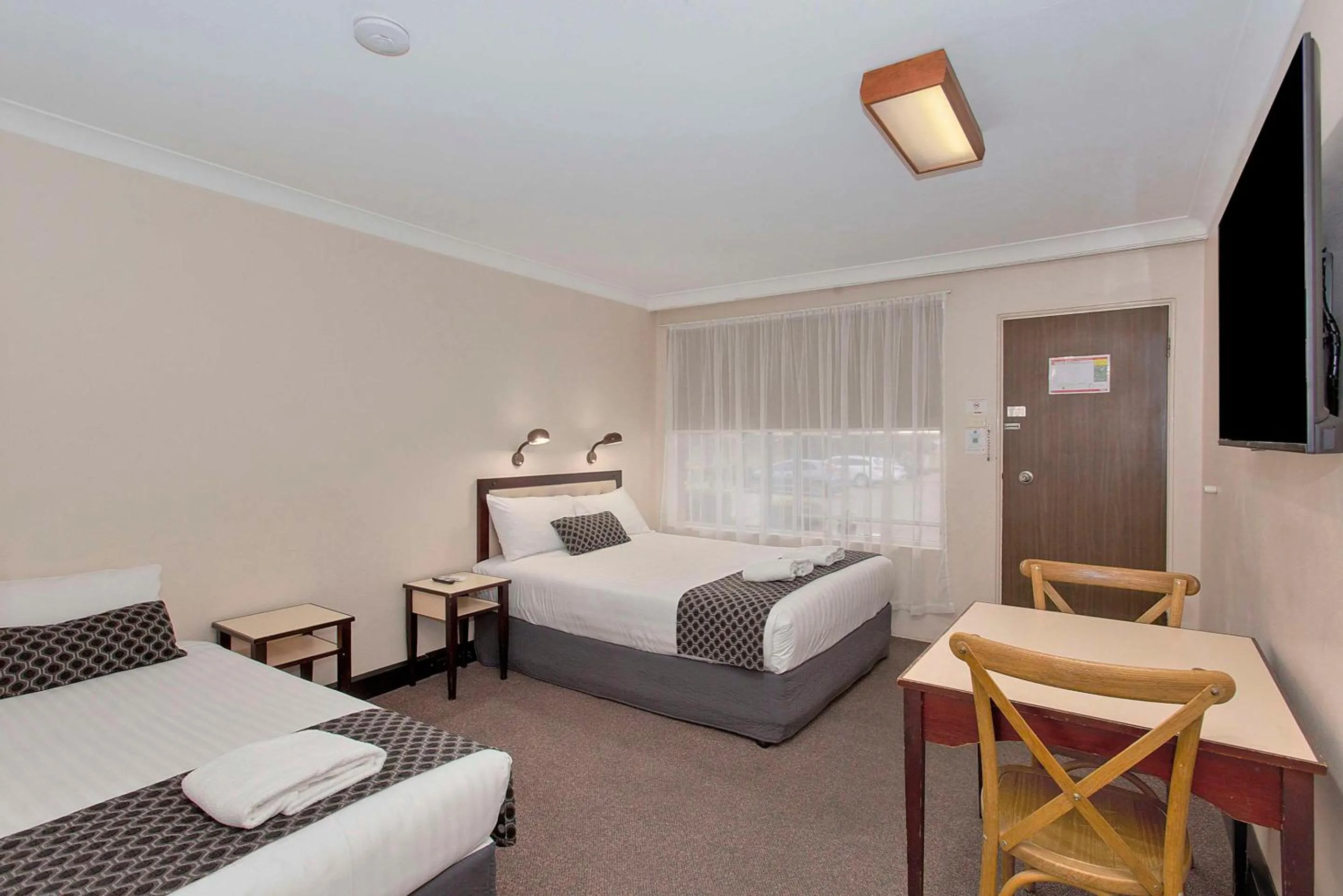 Bedroom, Bed in Econo Lodge Savannah Park Tamworth