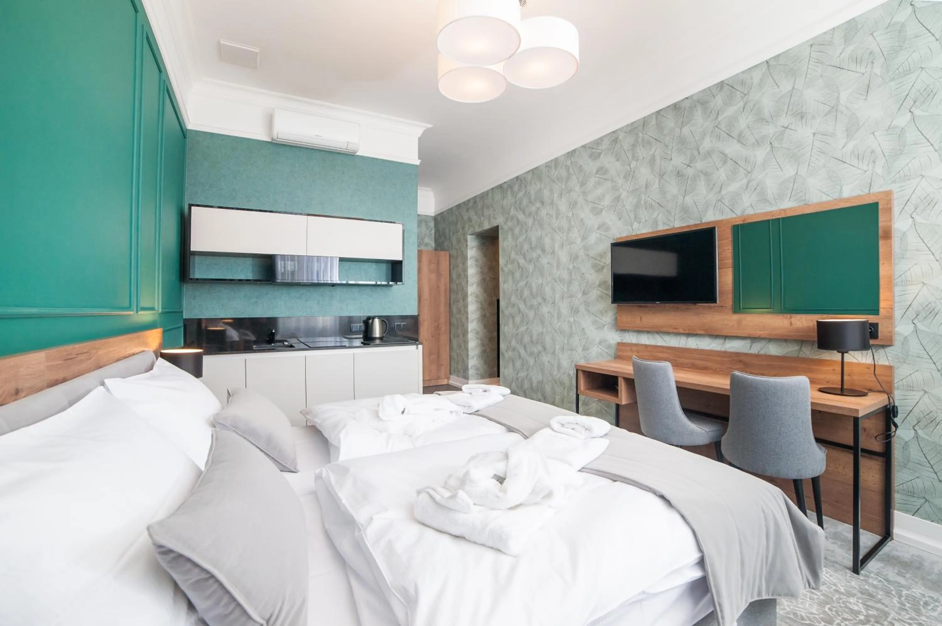 Kitchen or kitchenette, Bed in Vinfort Aparthotel