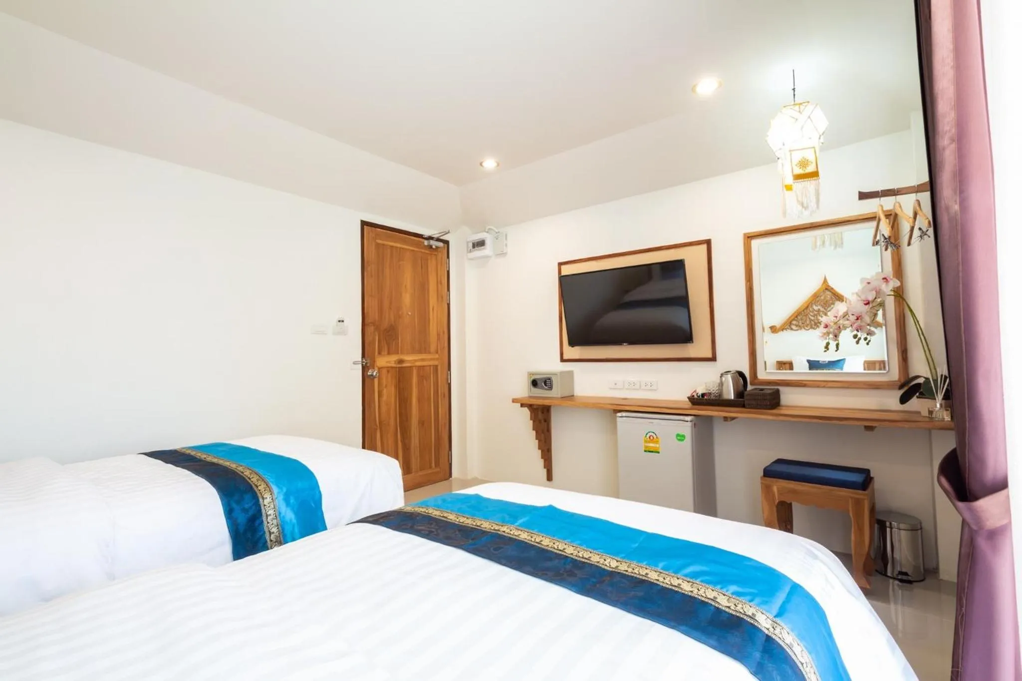 Bed in Anumat Premium Budget Hotel