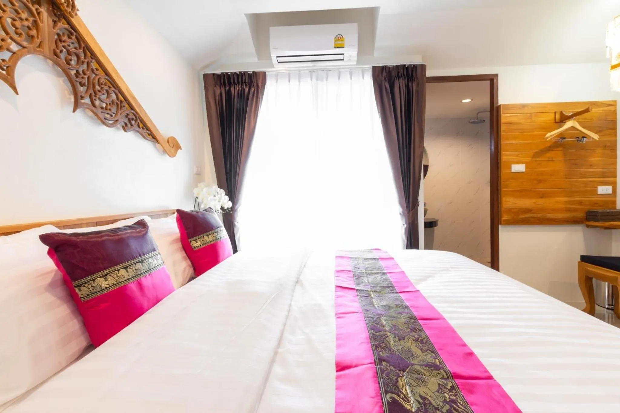 Bed in Anumat Premium Budget Hotel