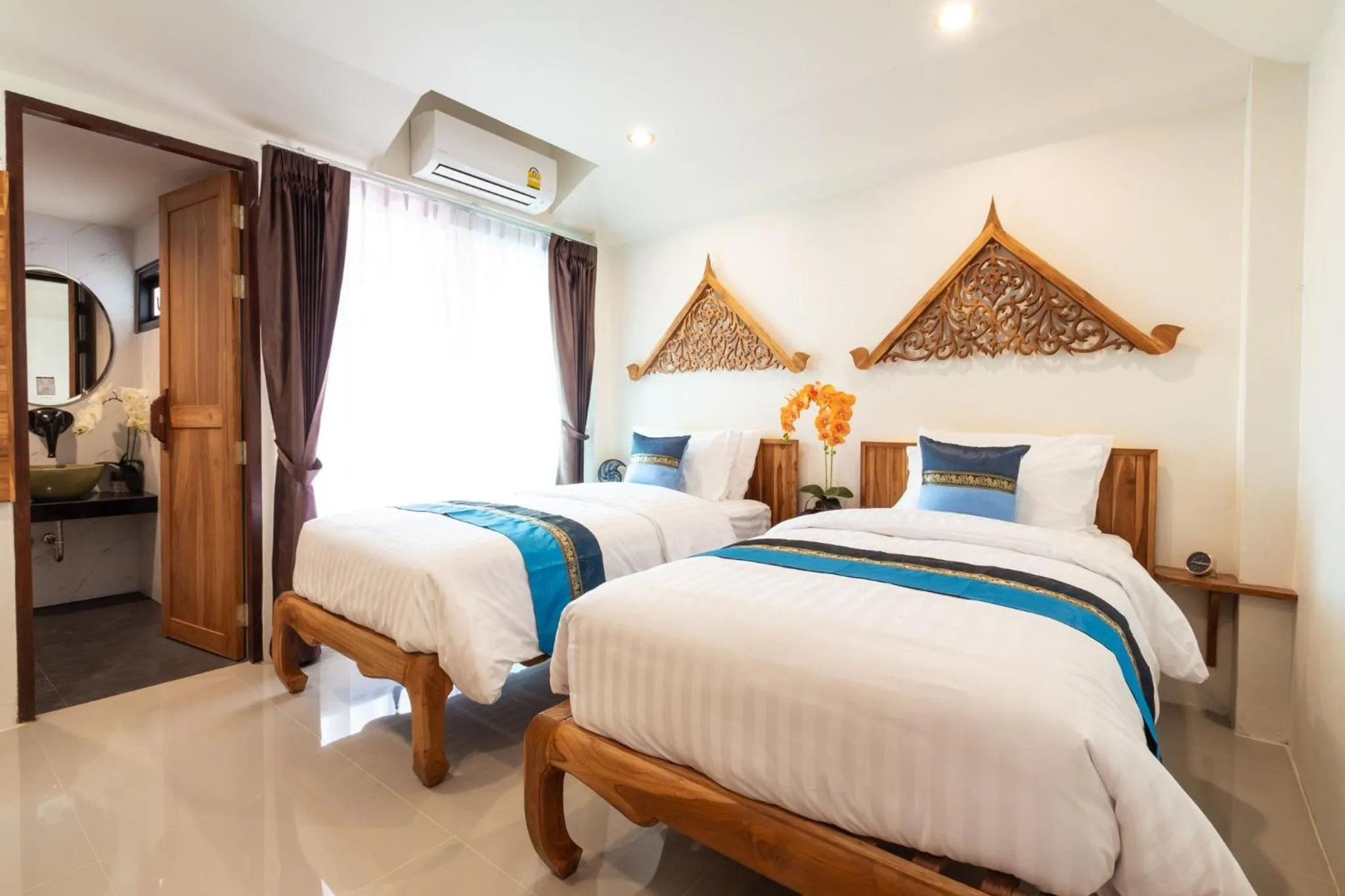 Bed in Anumat Premium Budget Hotel