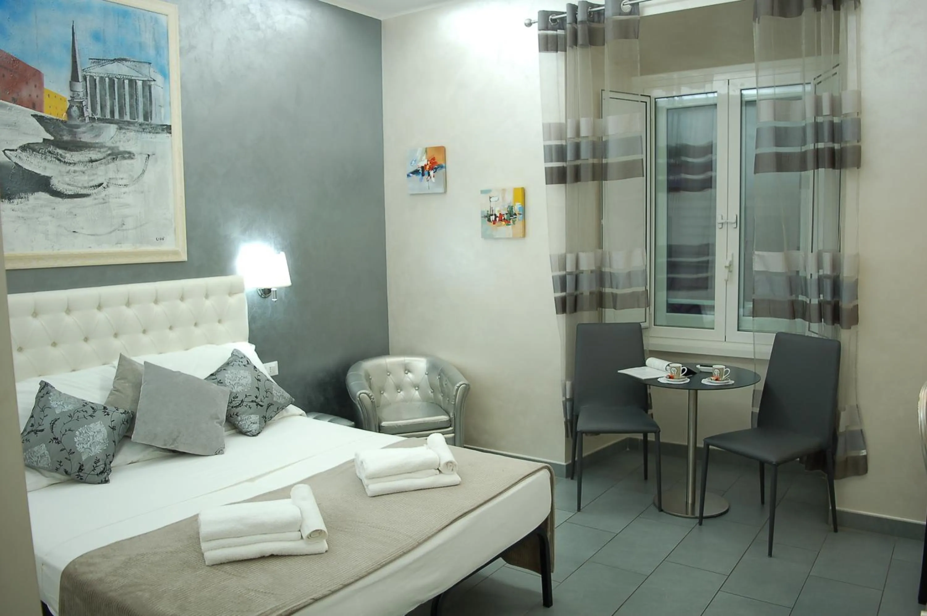 Photo of the whole room, Bed in Relais Cavour Inn