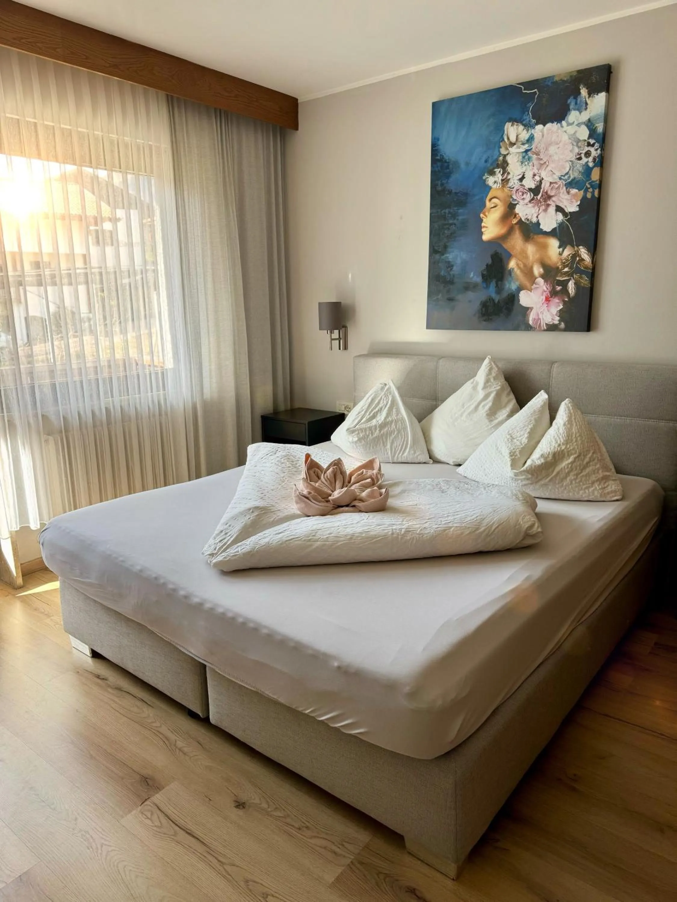 Bed in Hotel Residence MaVie