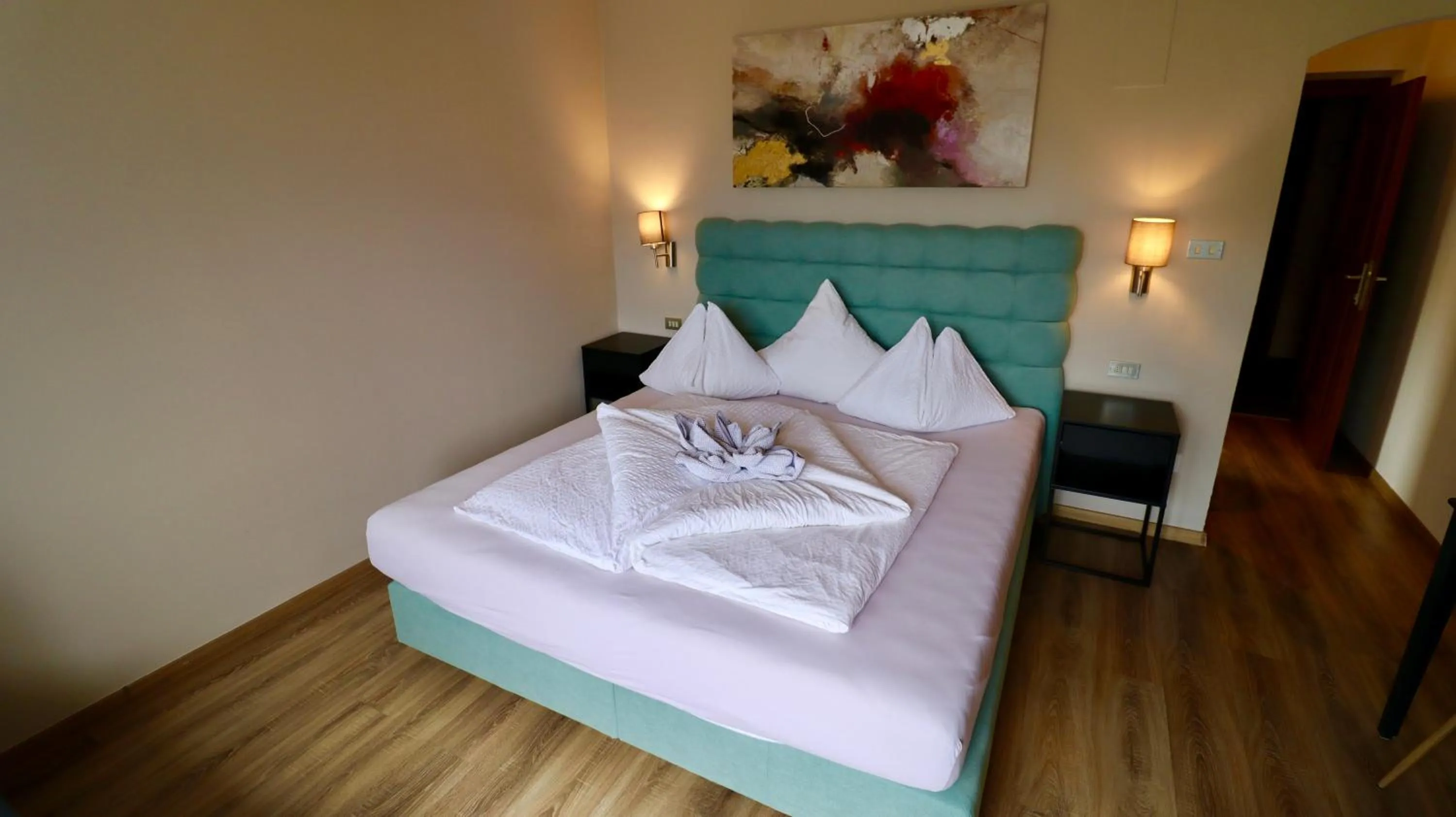 Bed in Hotel Residence MaVie