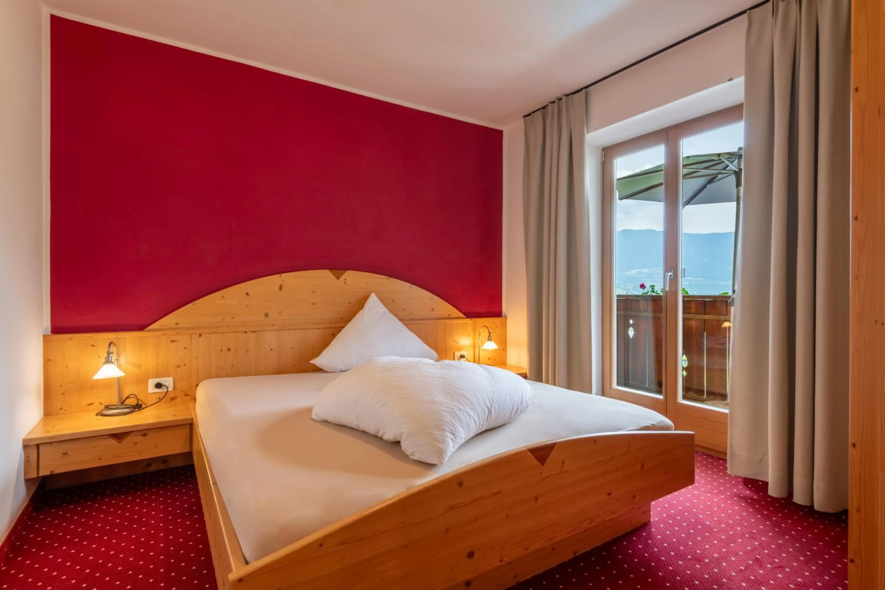 Bed in Hotel Residence MaVie