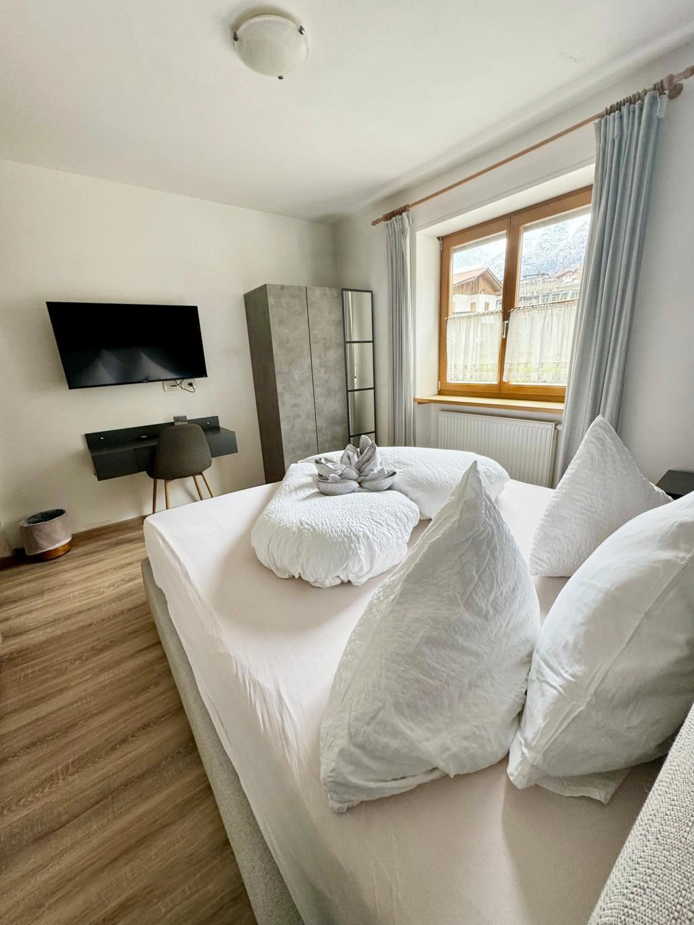 Bed in Hotel Residence MaVie