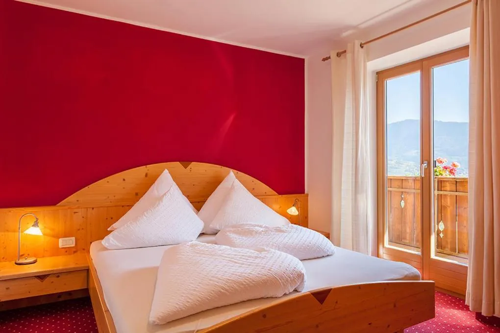 Bed in Hotel Residence MaVie