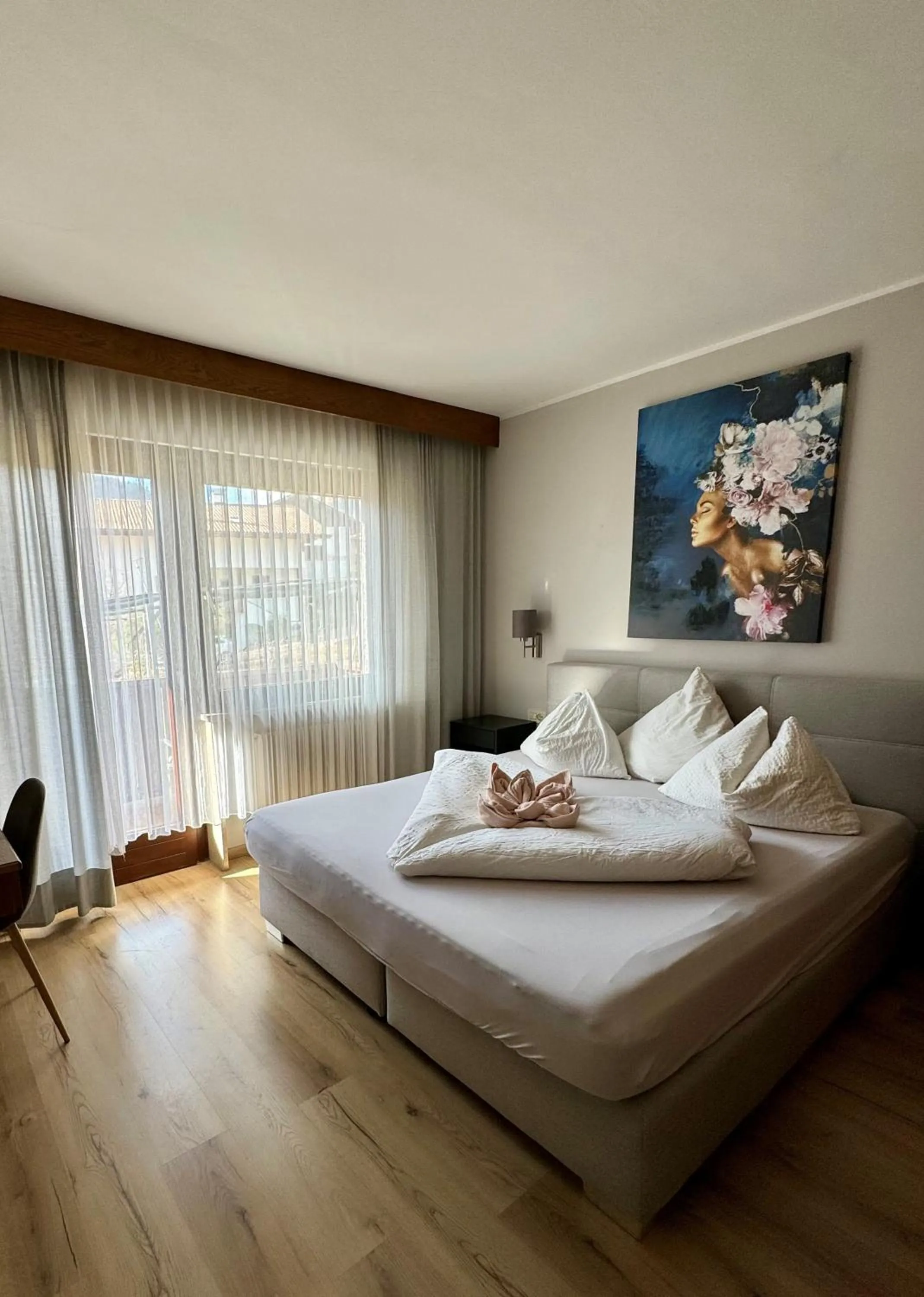 Bed in Hotel Residence MaVie