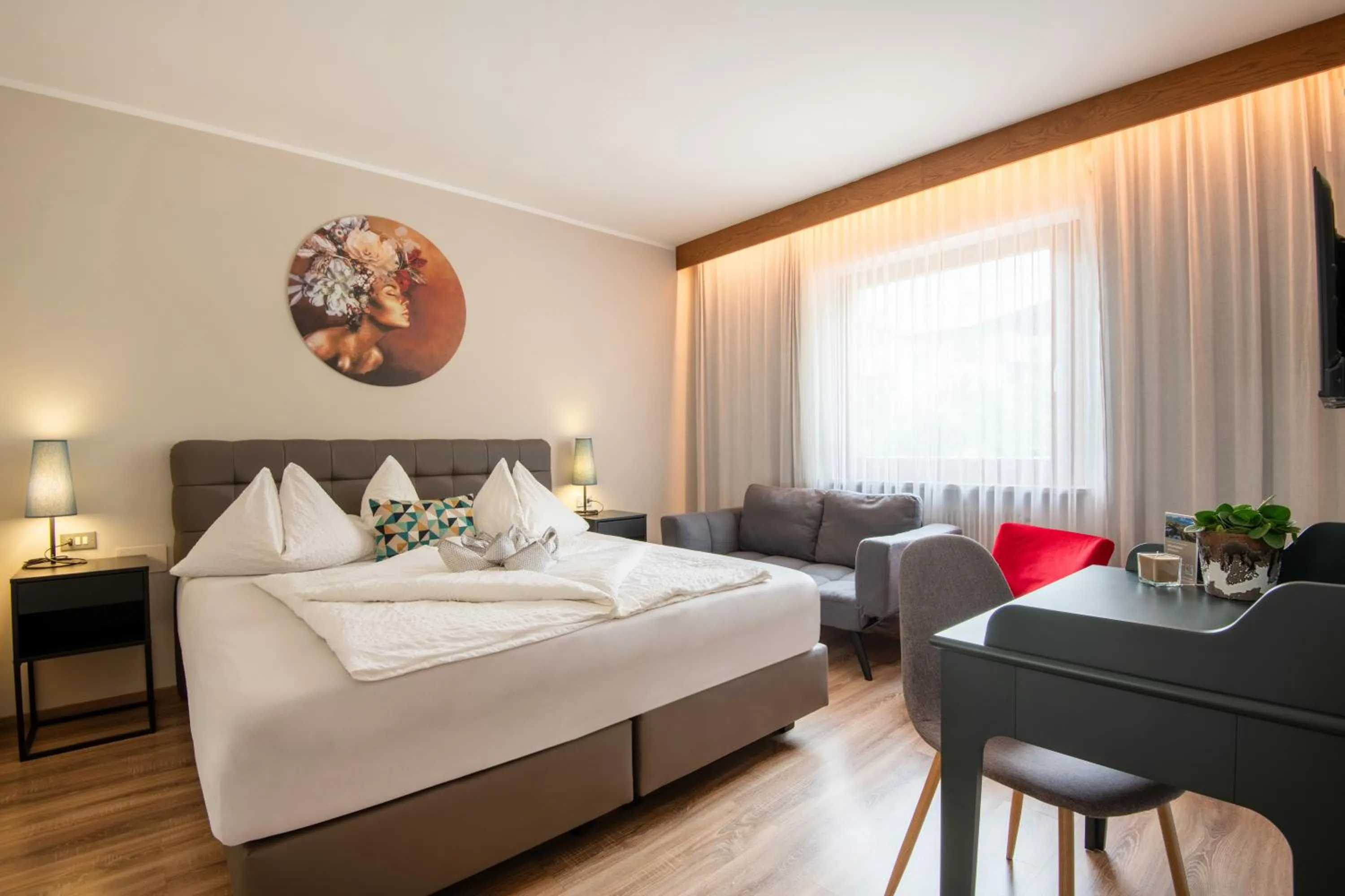 Bed in Hotel Residence MaVie