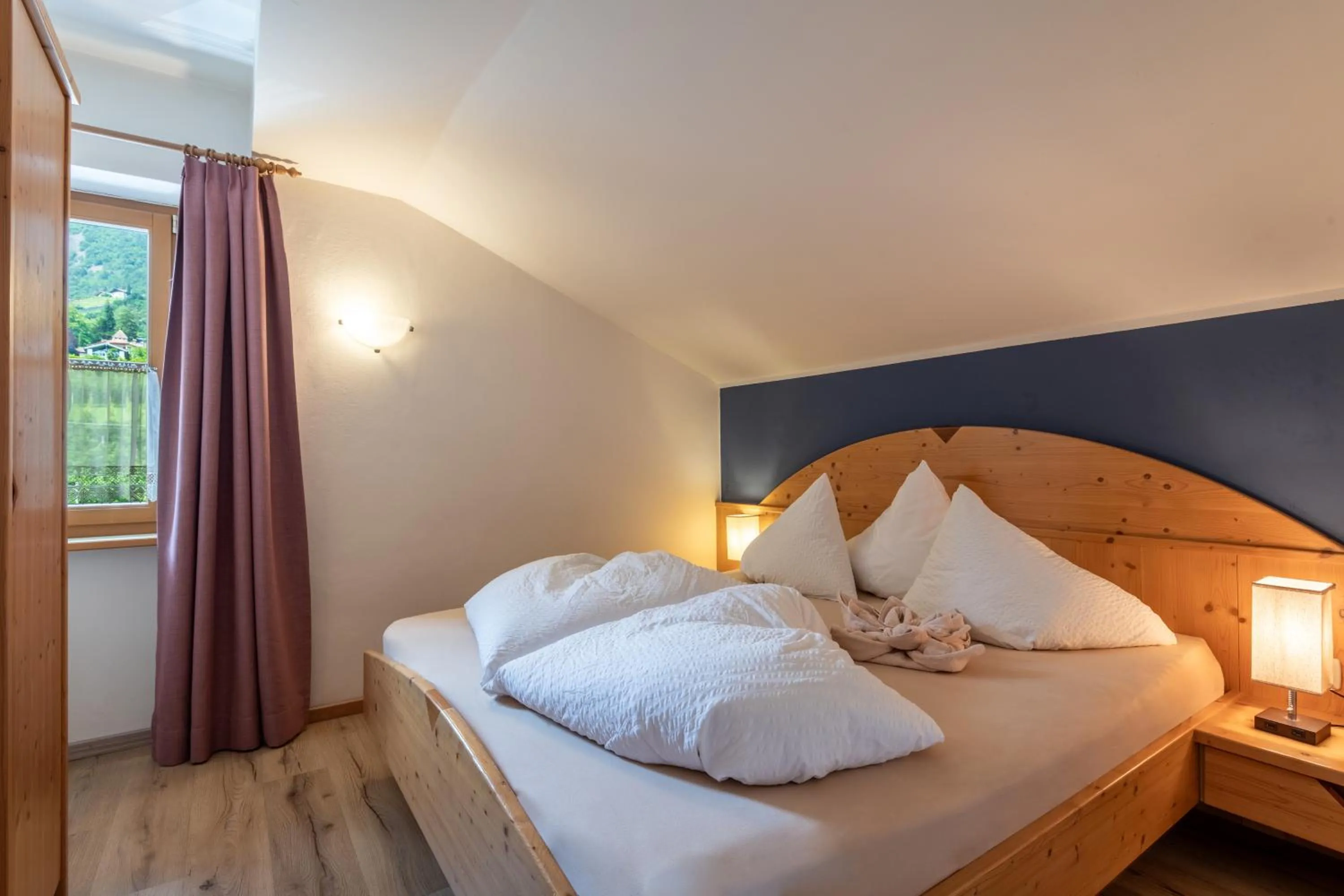 Bed in Hotel Residence MaVie