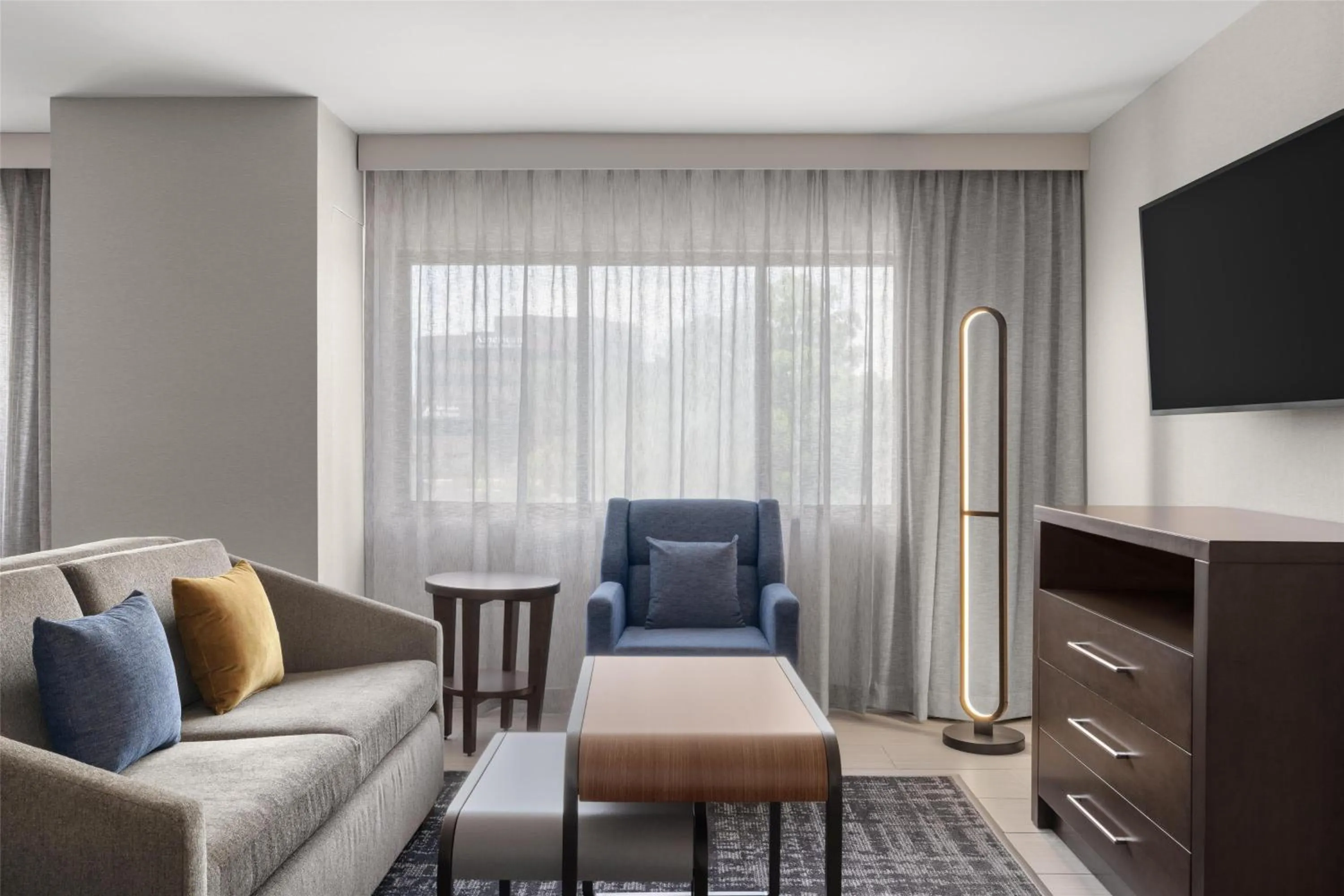 Living room in Homewood Suites by Hilton Indianapolis Carmel