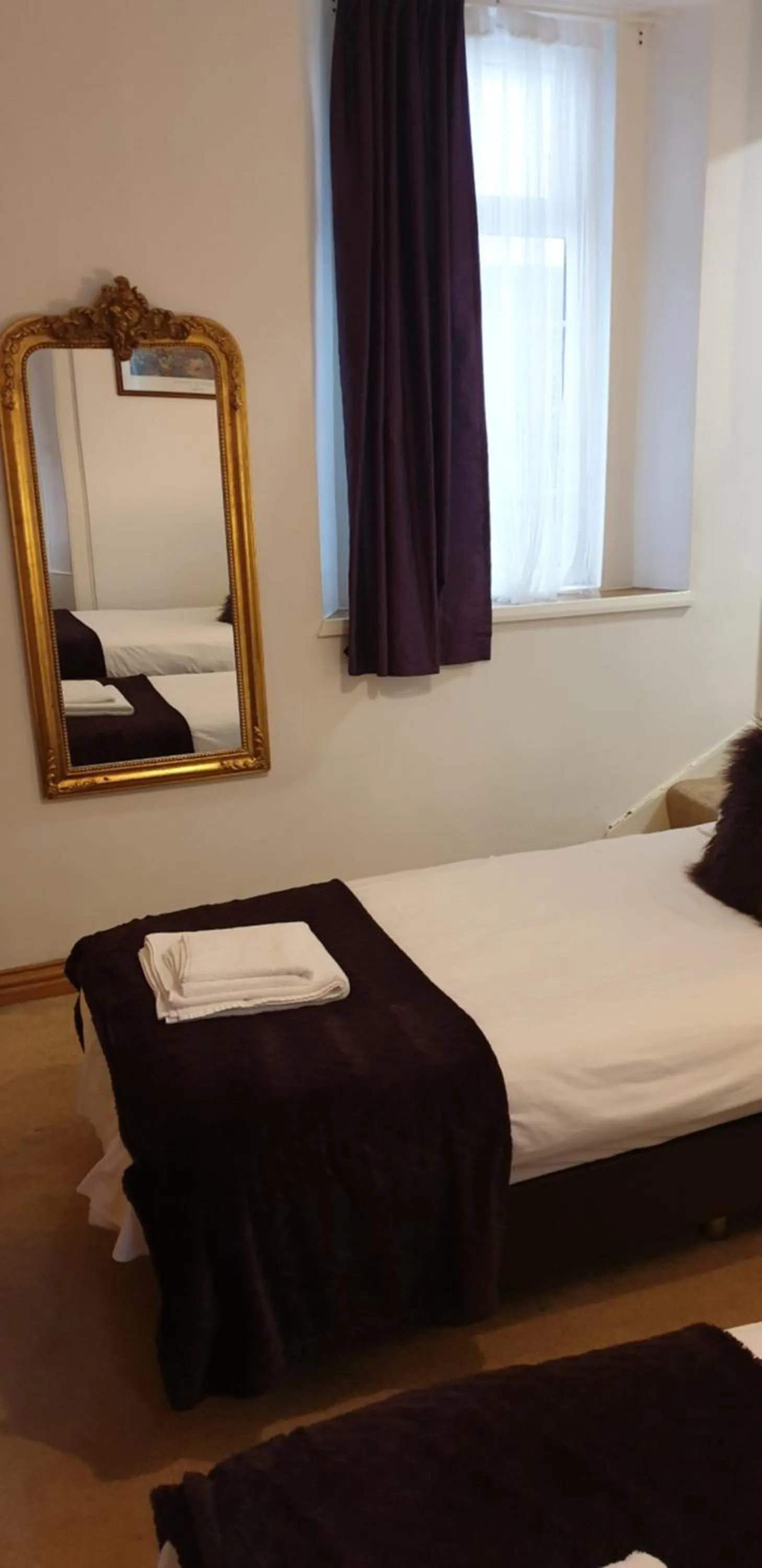 Bed in The Spread Eagle Hotel