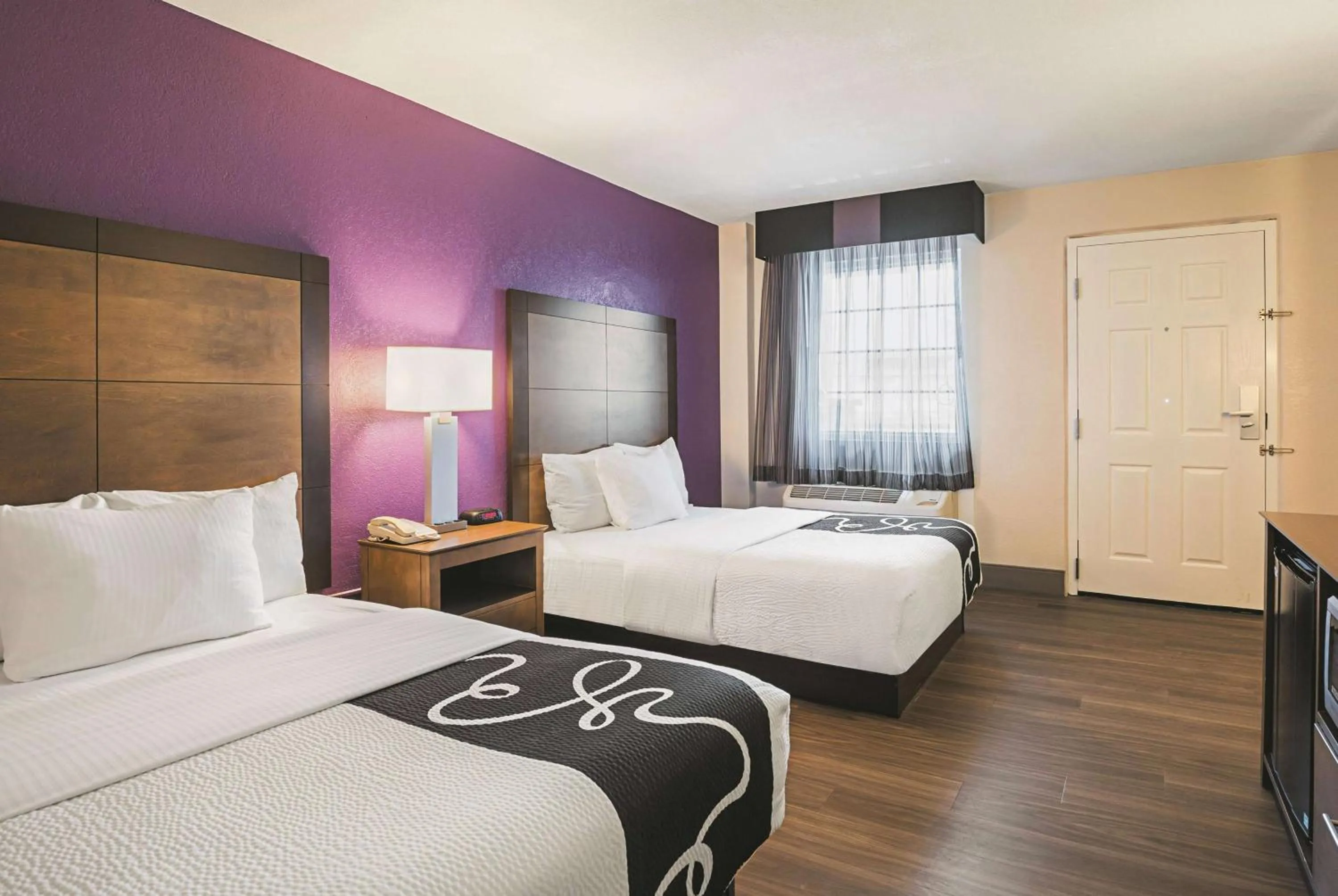 Photo of the whole room, Bed in Wingate by Wyndham Galveston Beachfront at the Seawall