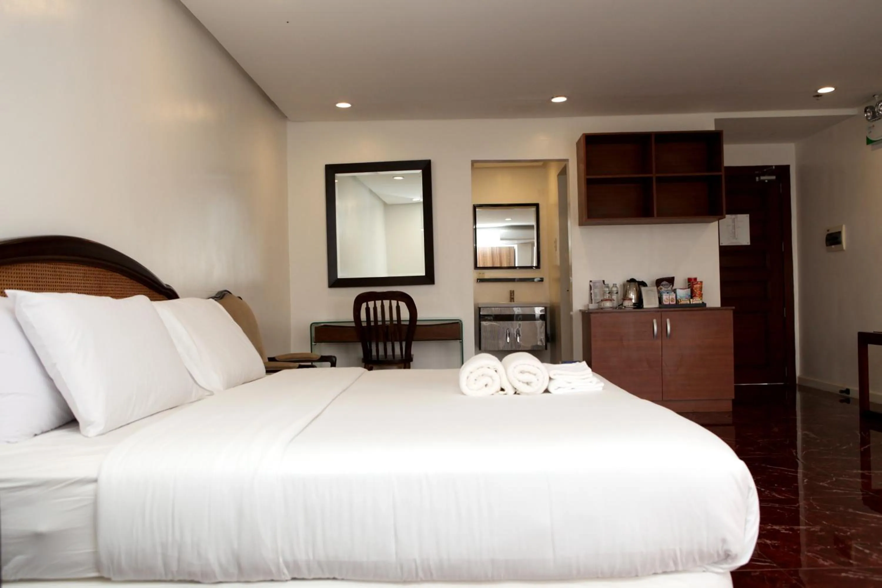 Photo of the whole room, Bed in Centtro Residences