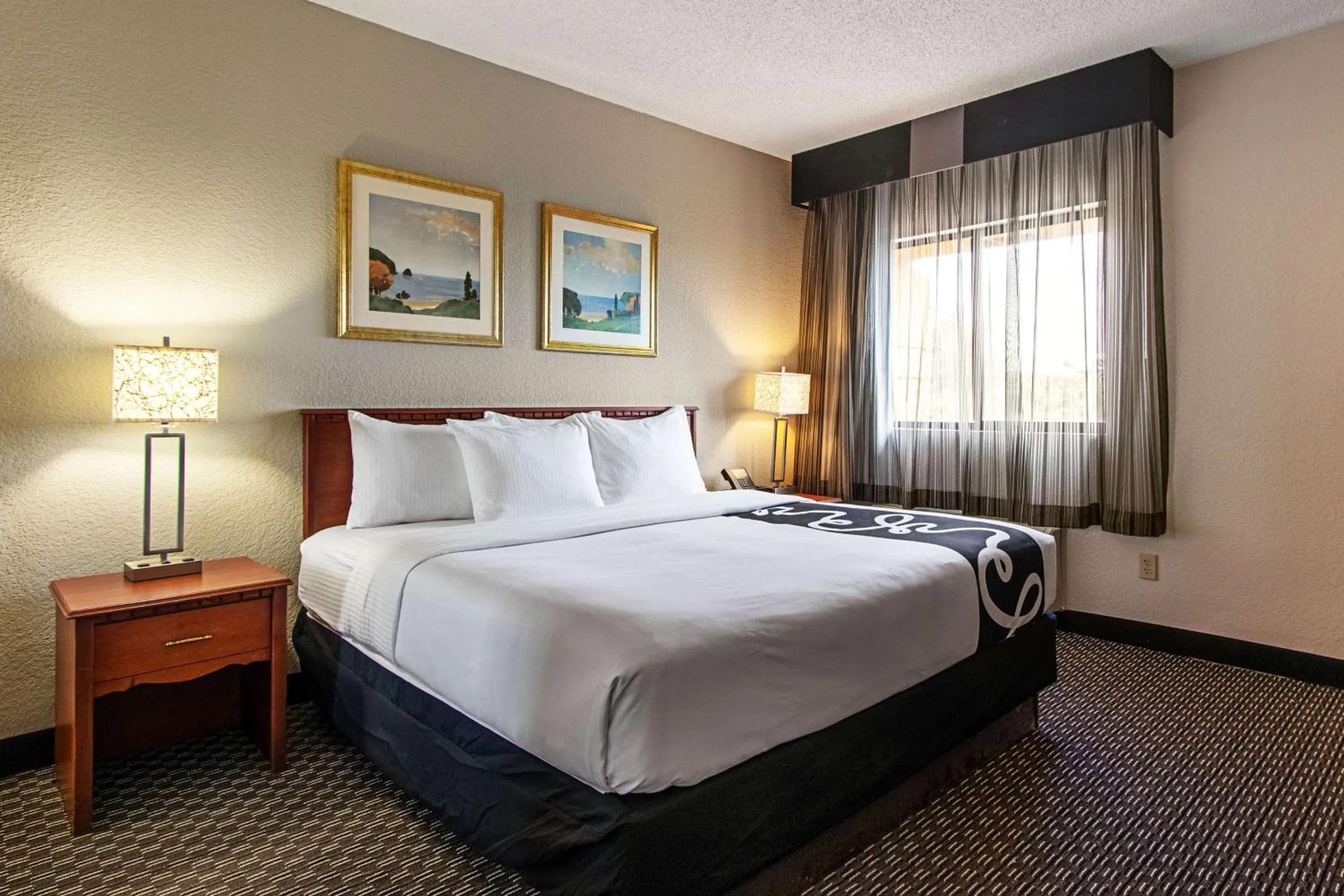 Photo of the whole room, Bed in La Quinta Inn by Wyndham Ft. Lauderdale Tamarac East