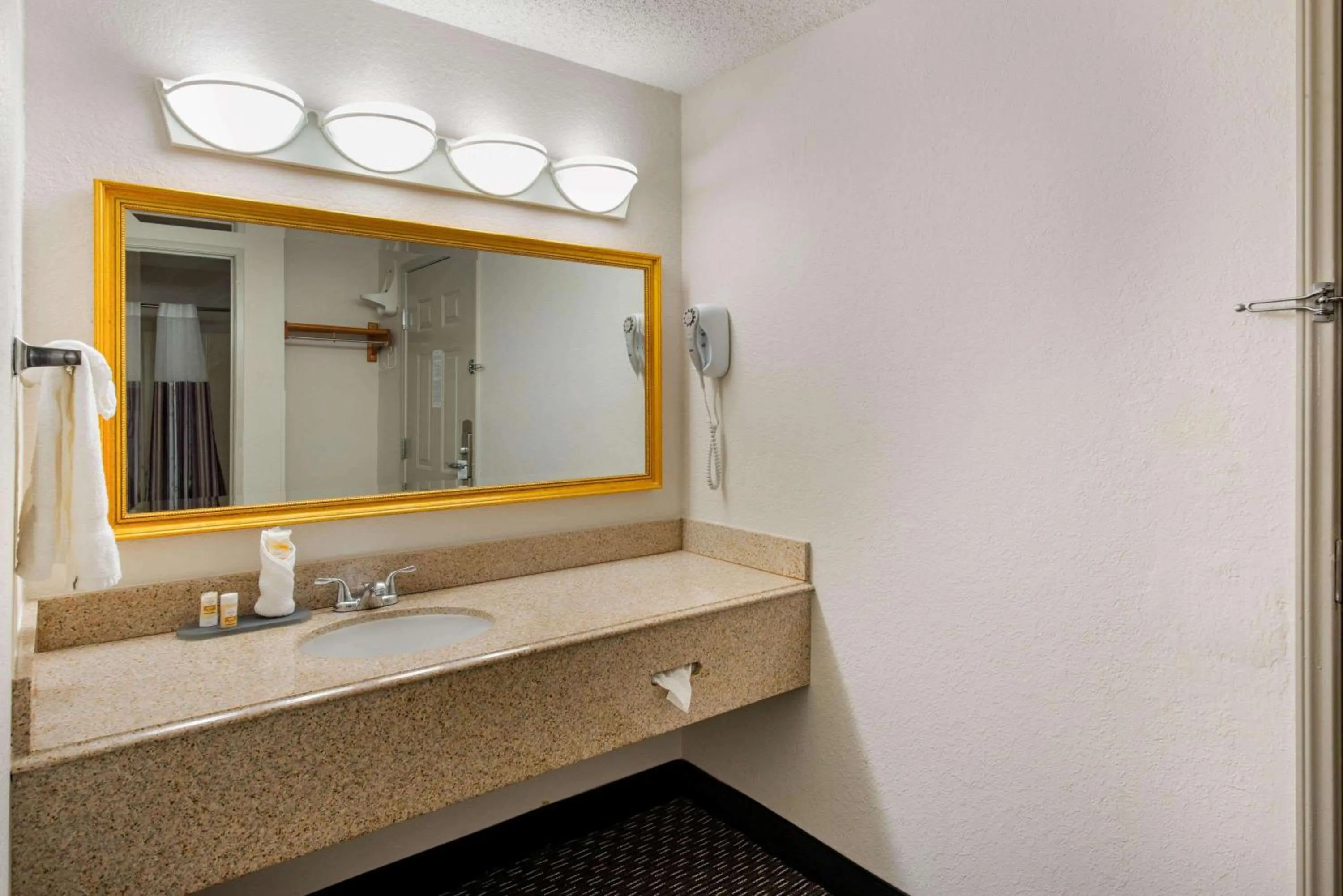 Bathroom in La Quinta Inn by Wyndham Ft. Lauderdale Tamarac East