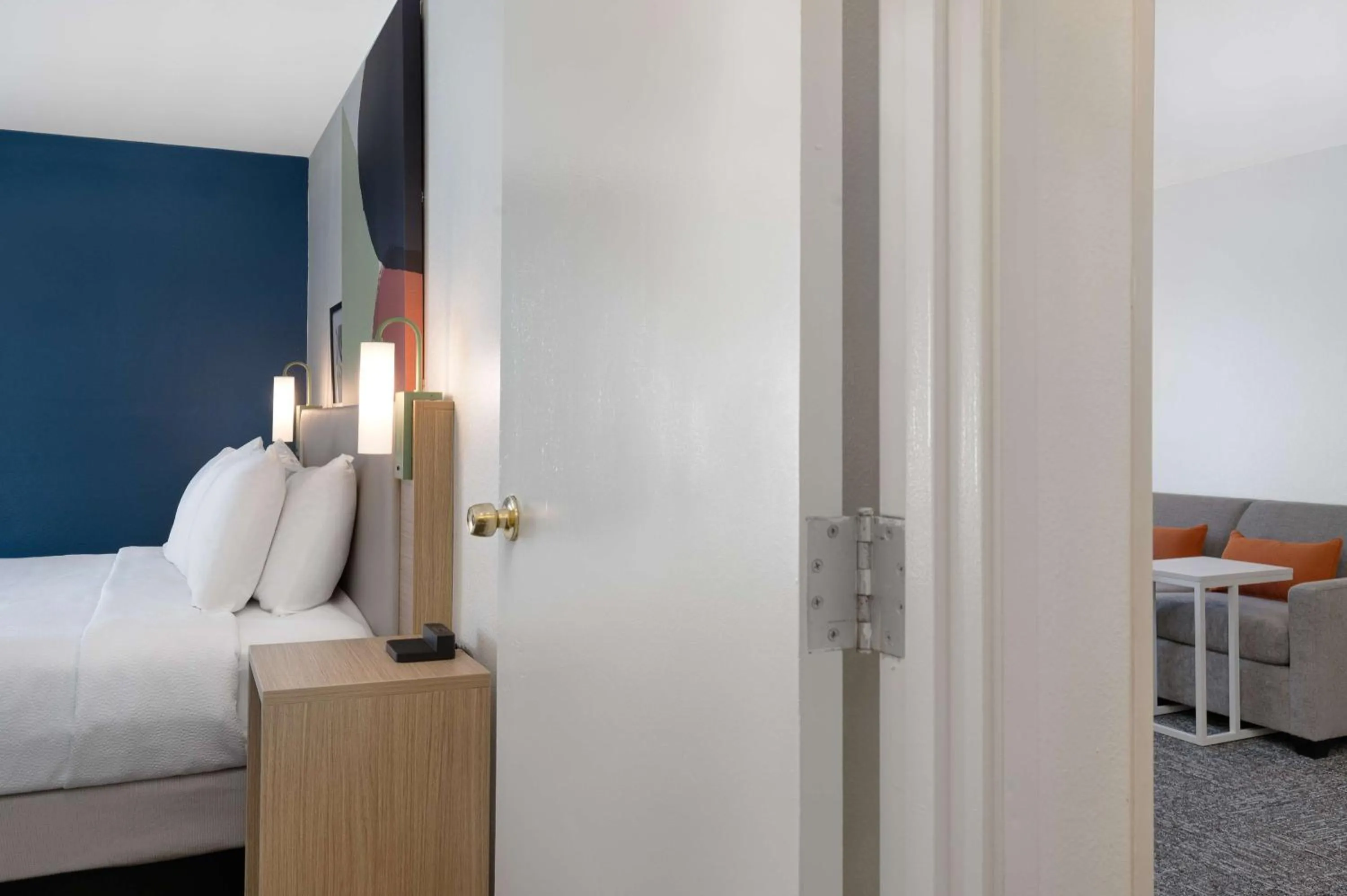 Living room, Bed in Spark by Hilton Savannah Midtown