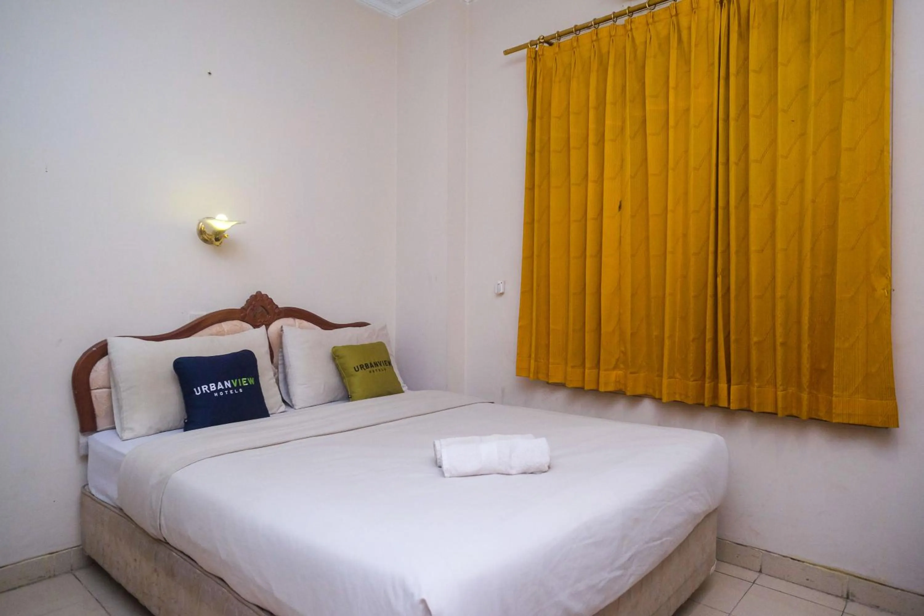 Bedroom, Bed in Urbanview Hotel Pondok Anggun Yogyakarta by RedDoorz