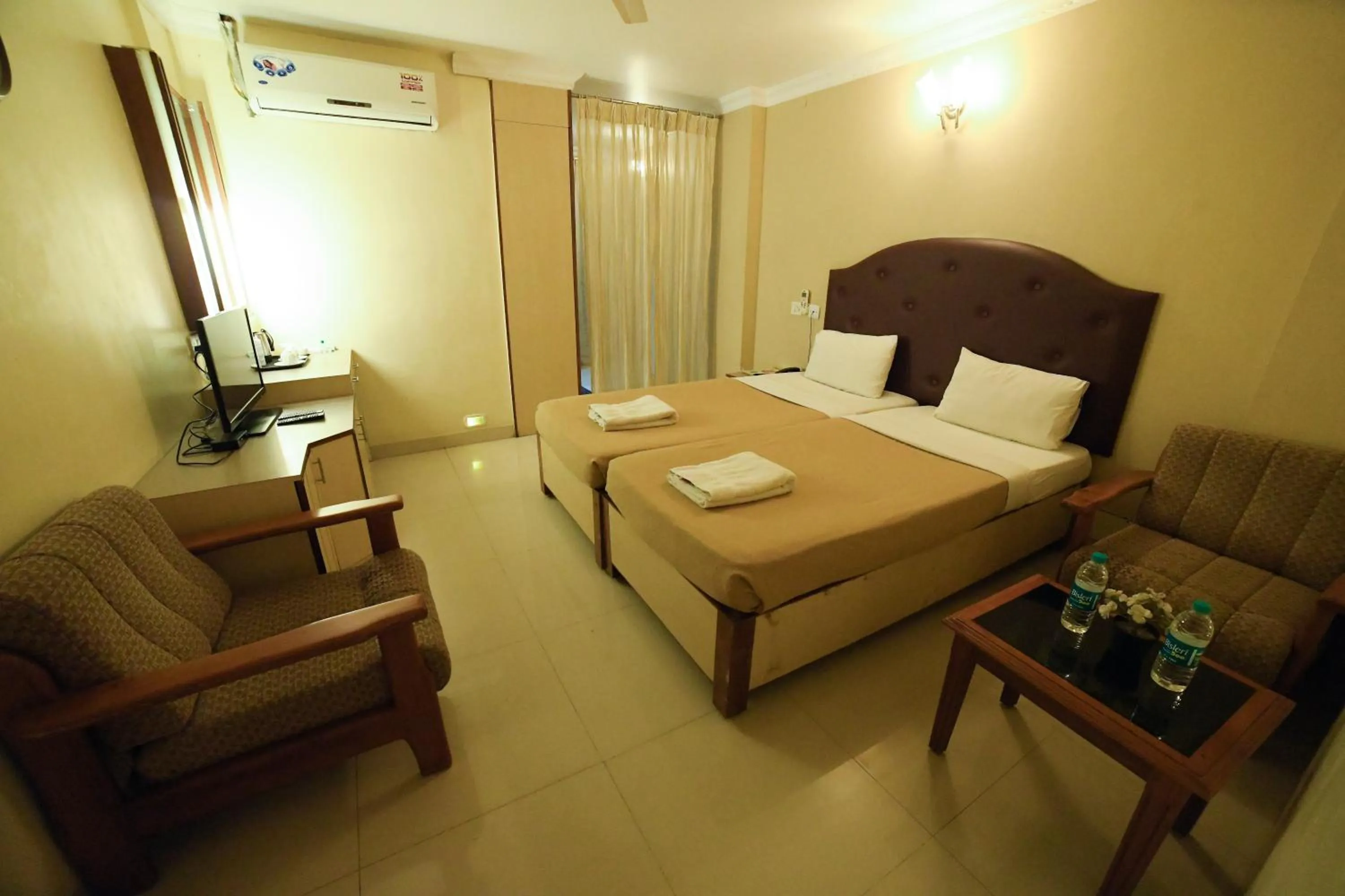 Bed in HOTEL UDUPI INTERNATIONAL
