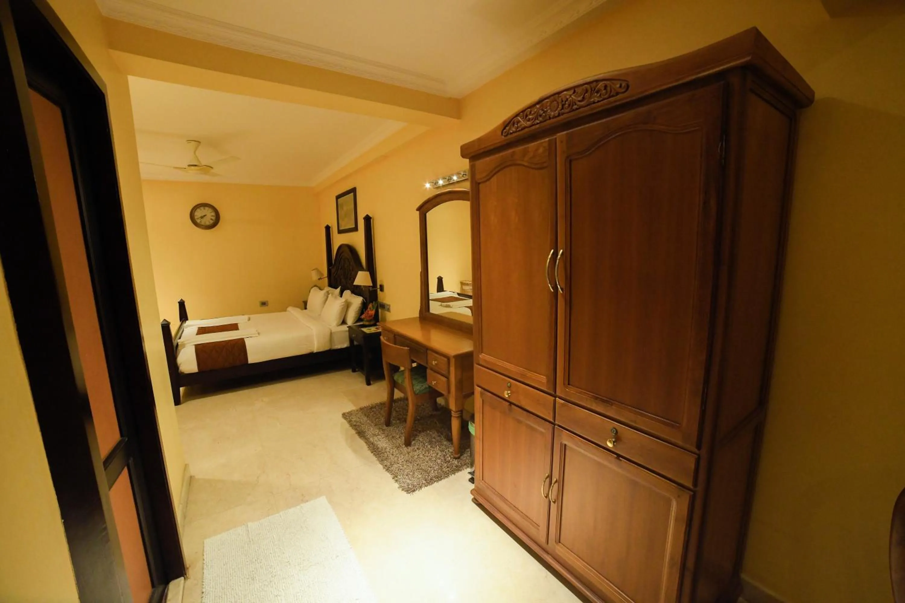 Bed in HOTEL UDUPI INTERNATIONAL