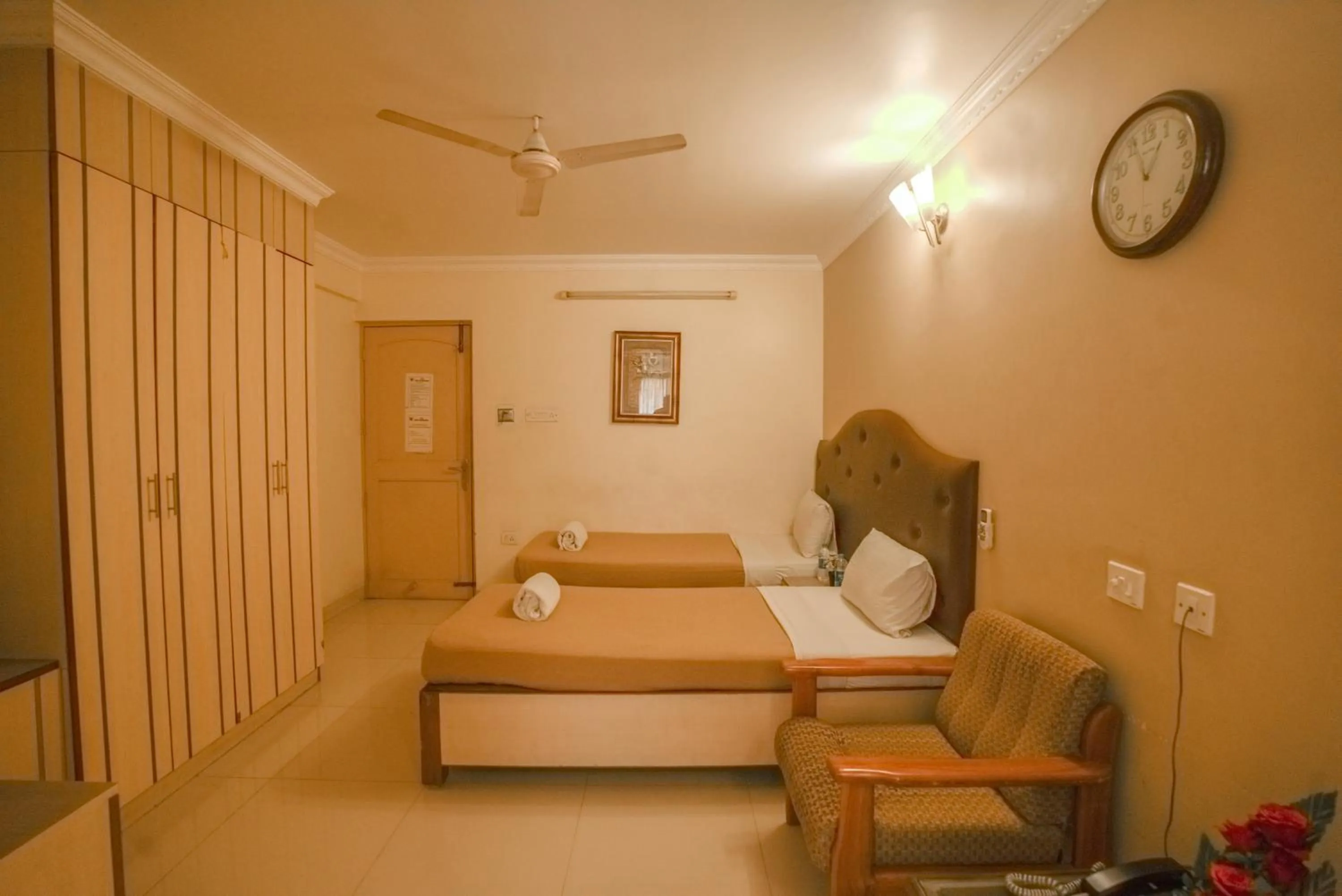 Bed in HOTEL UDUPI INTERNATIONAL