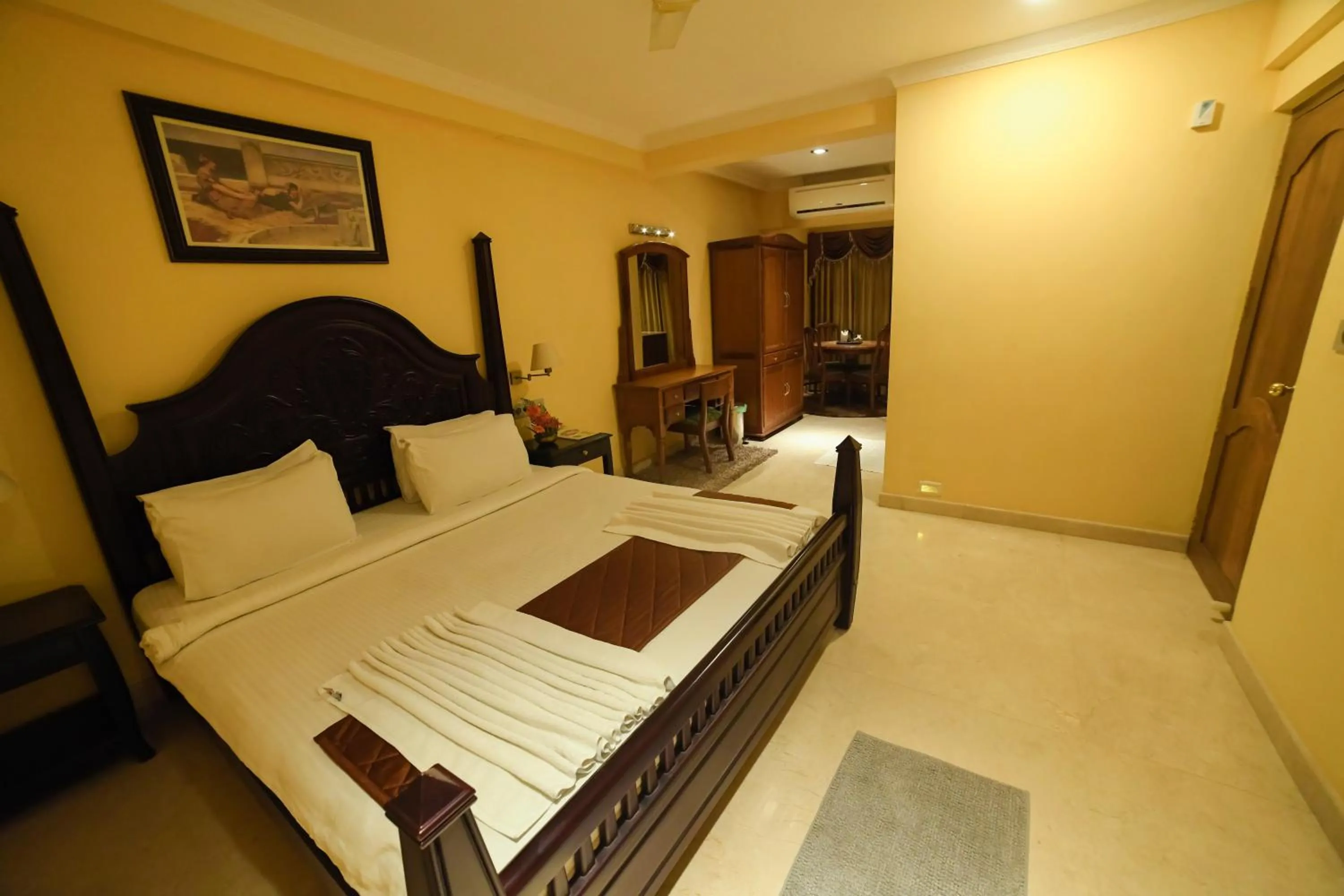 Bed in HOTEL UDUPI INTERNATIONAL