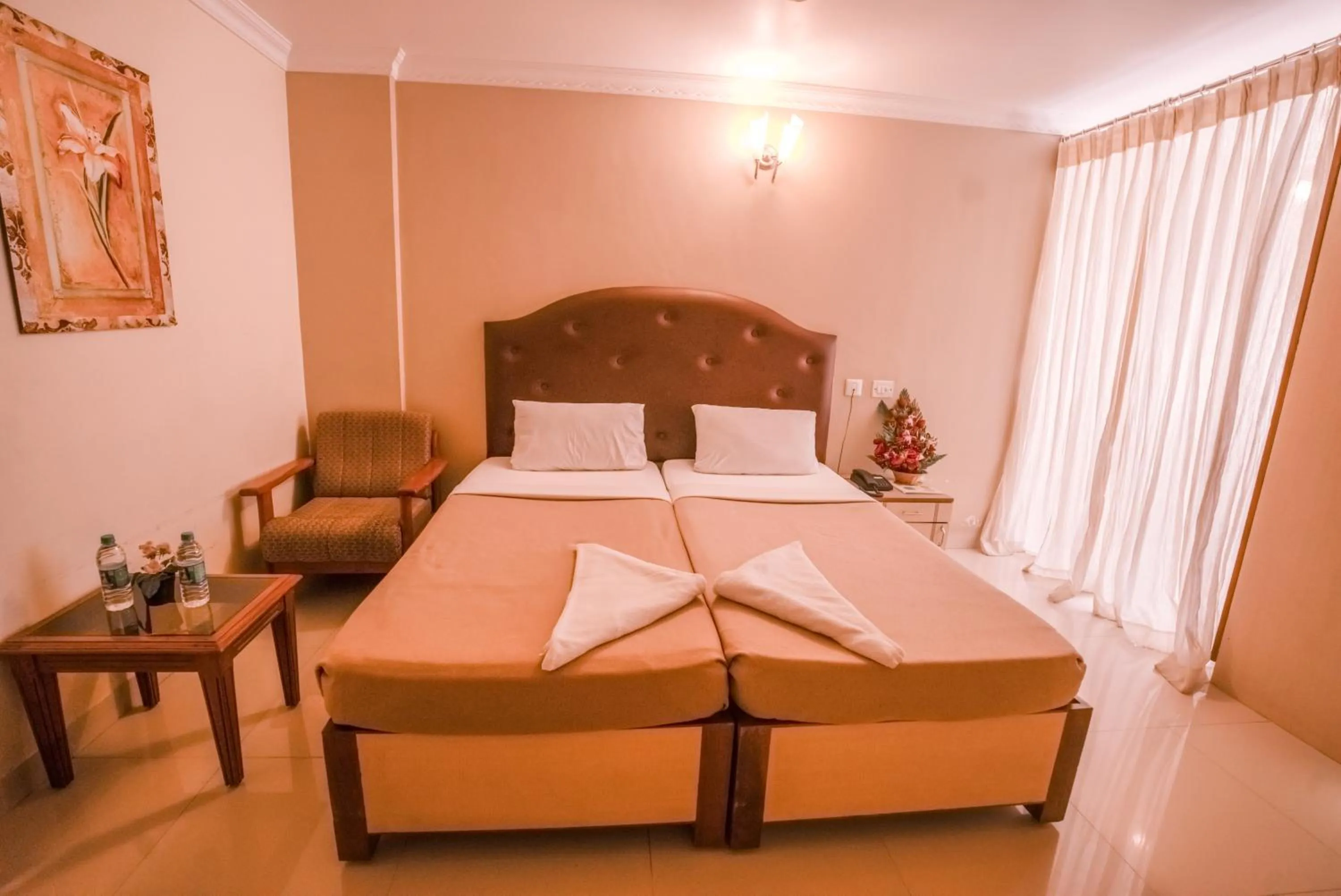 Bed in HOTEL UDUPI INTERNATIONAL