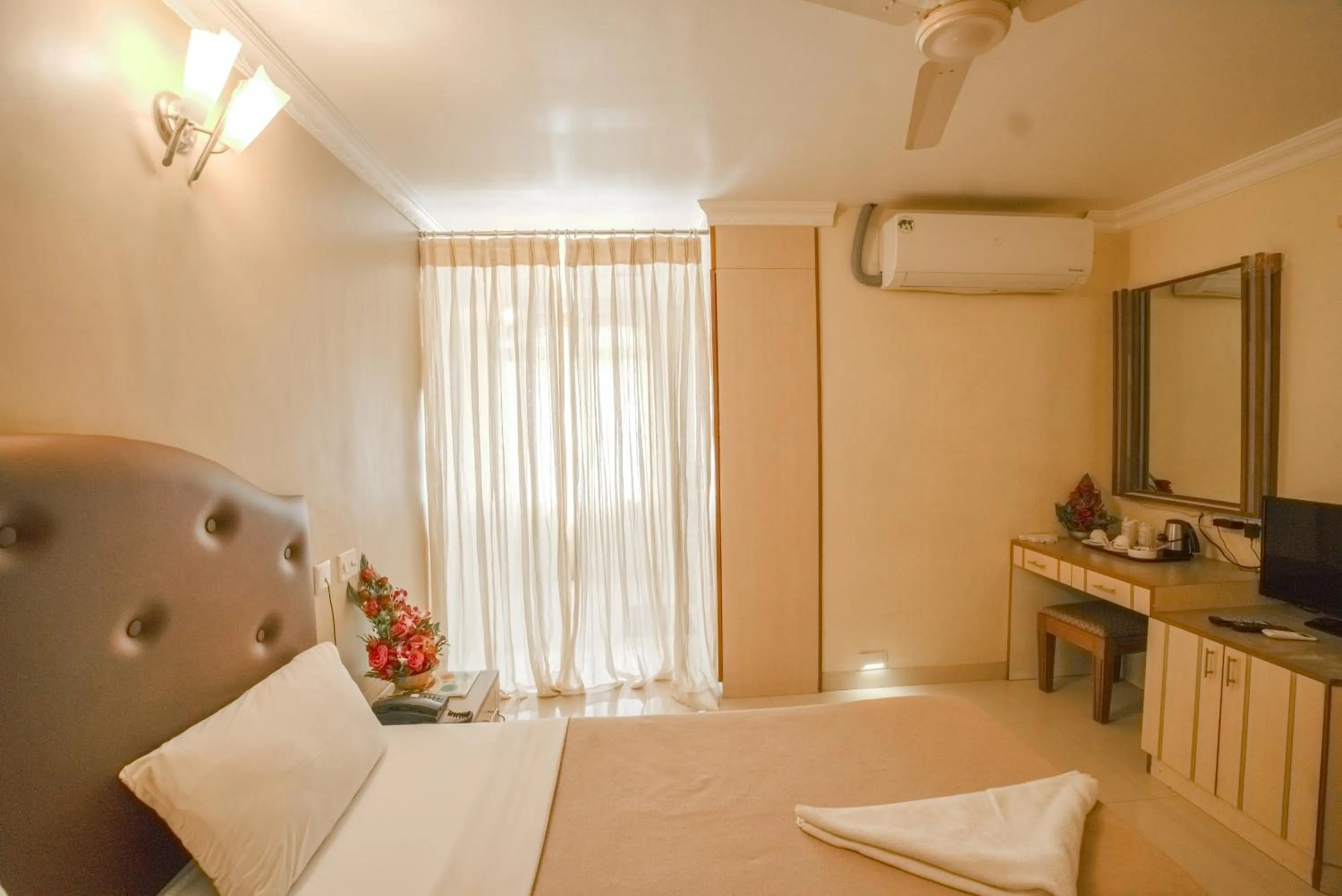 Bed in HOTEL UDUPI INTERNATIONAL