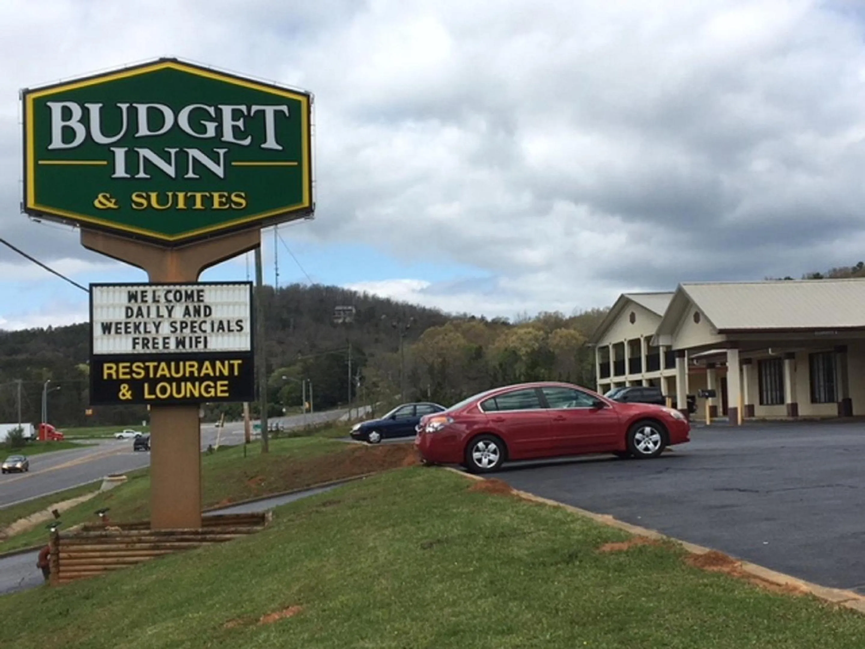 Property logo or sign in Budget Inn & Suites - Talladega